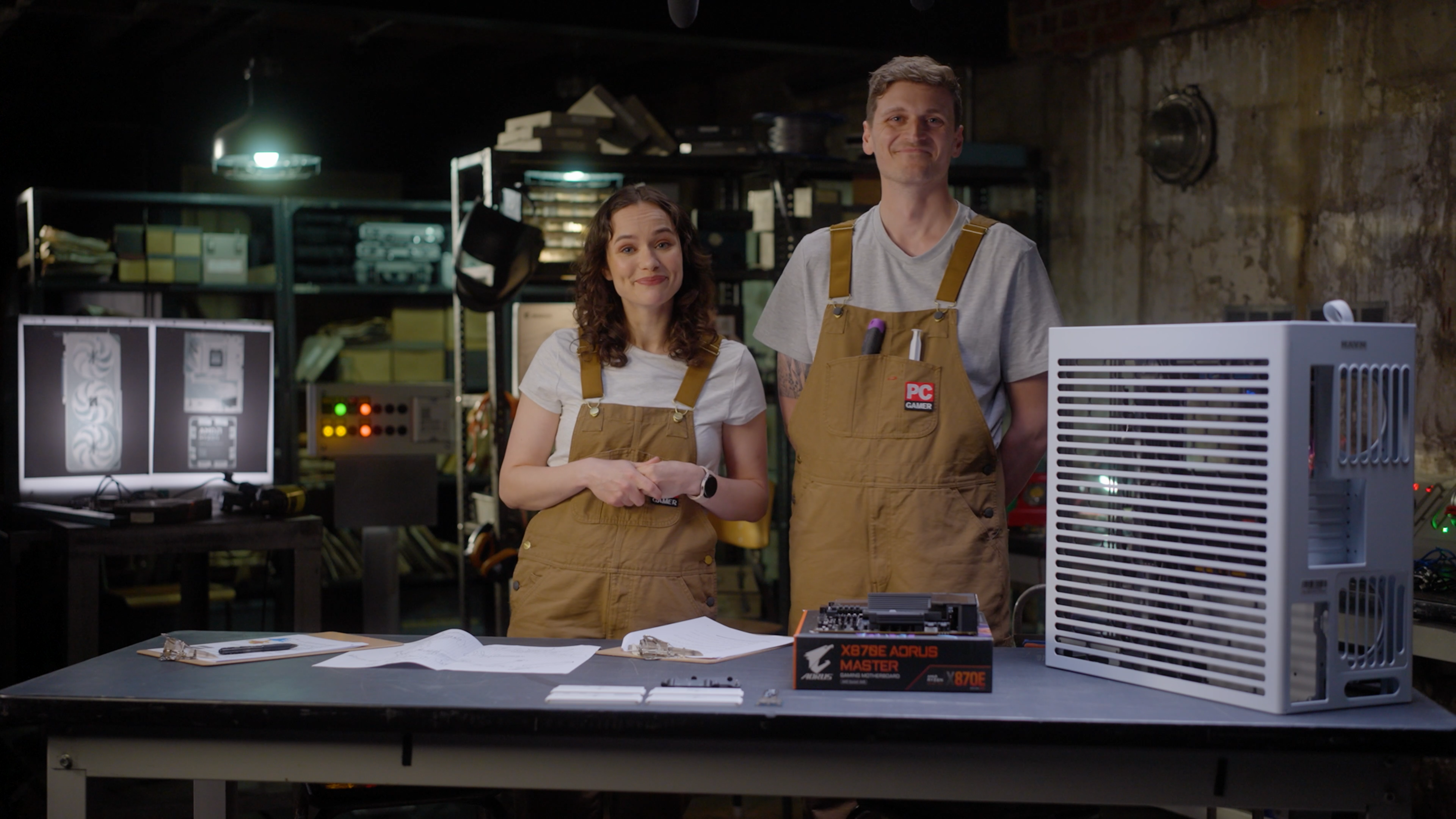 Frankie Ward and Jacob Ridley stand next to The Rig on set