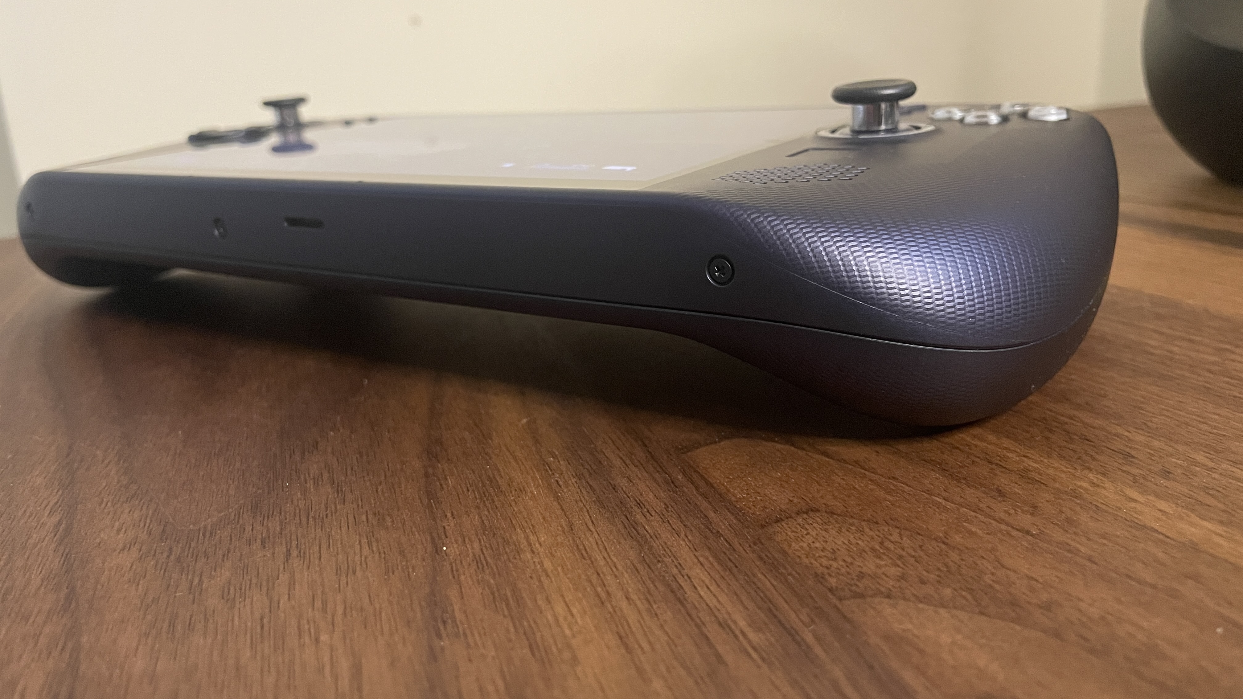 A Lenovo Legion Go S handheld with SteamOS in Nebula Nocturne colour scheme