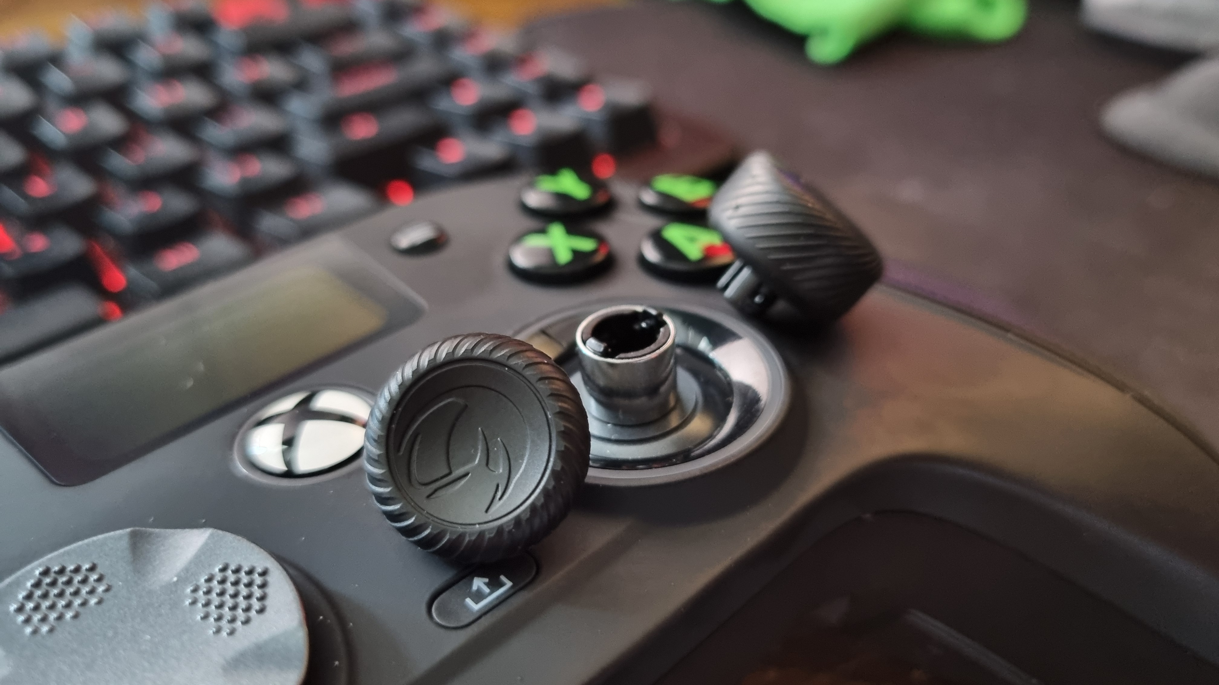 The Nacon Revolution X Unlimited with its thumbstick toppers removed