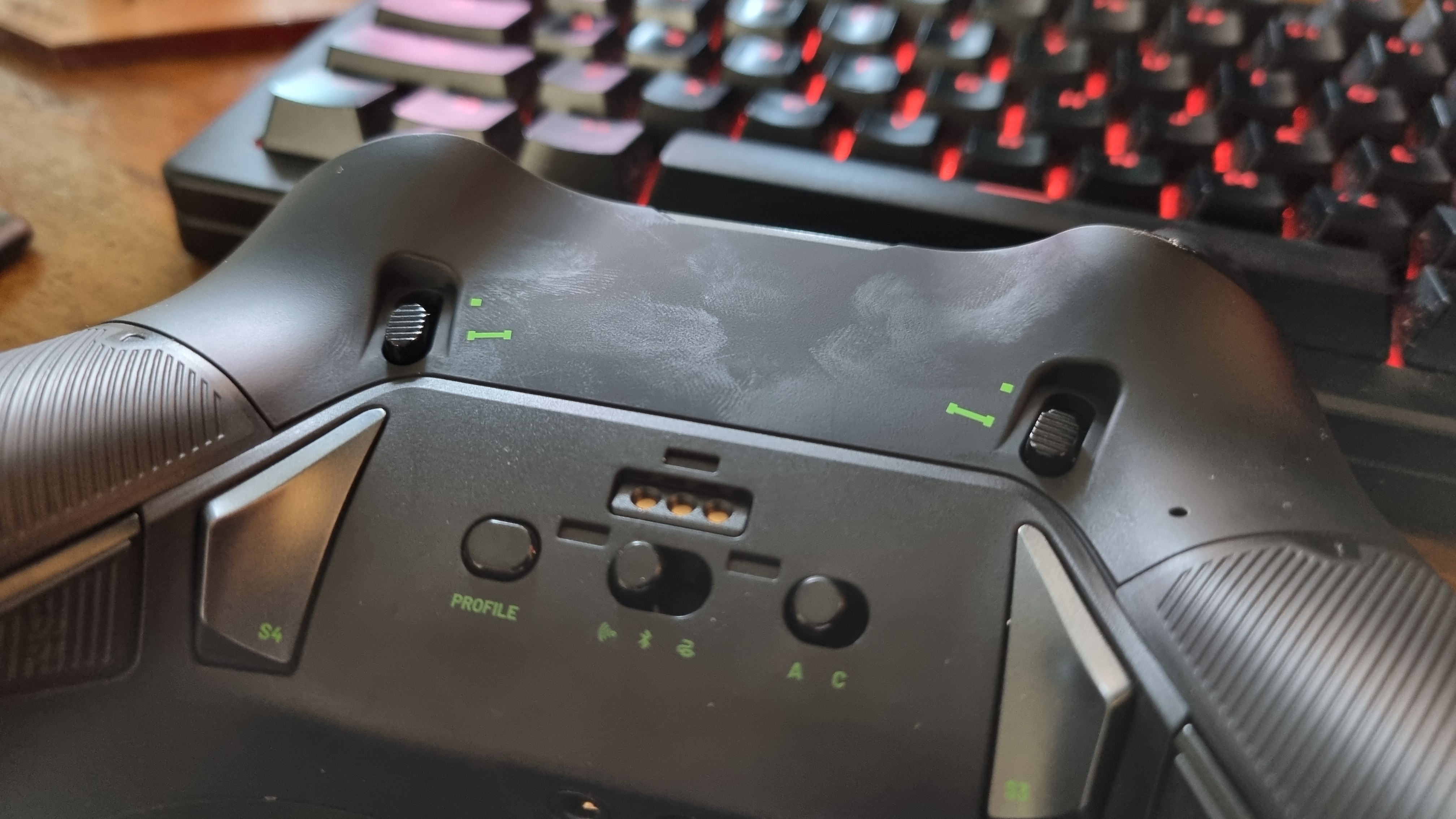 The rear of the Nacon Revolution X Unlimited, covered in delicious hand grease