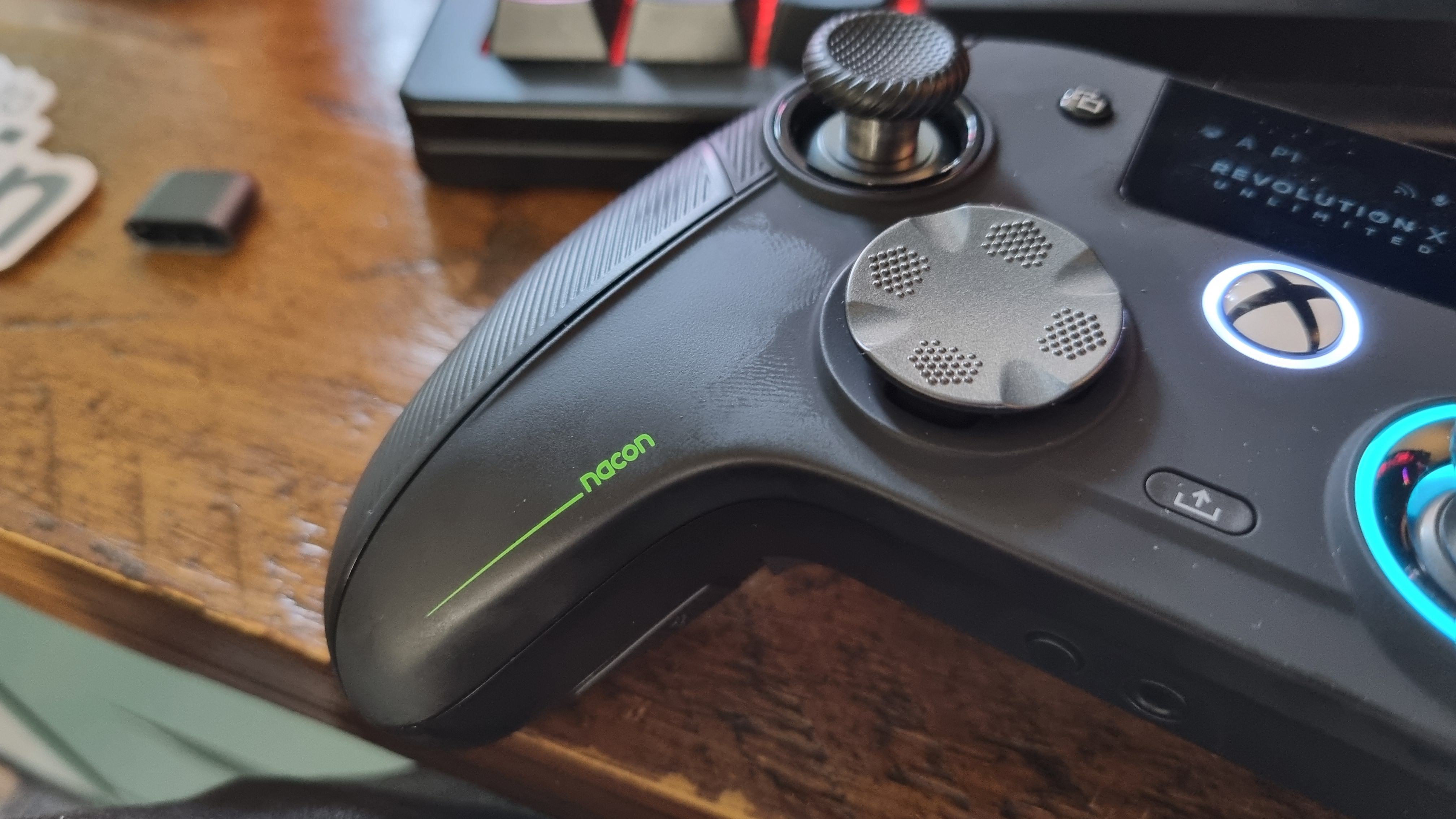 The front left grip of the Nacon Revolution X Unlimited, with visible grease marks