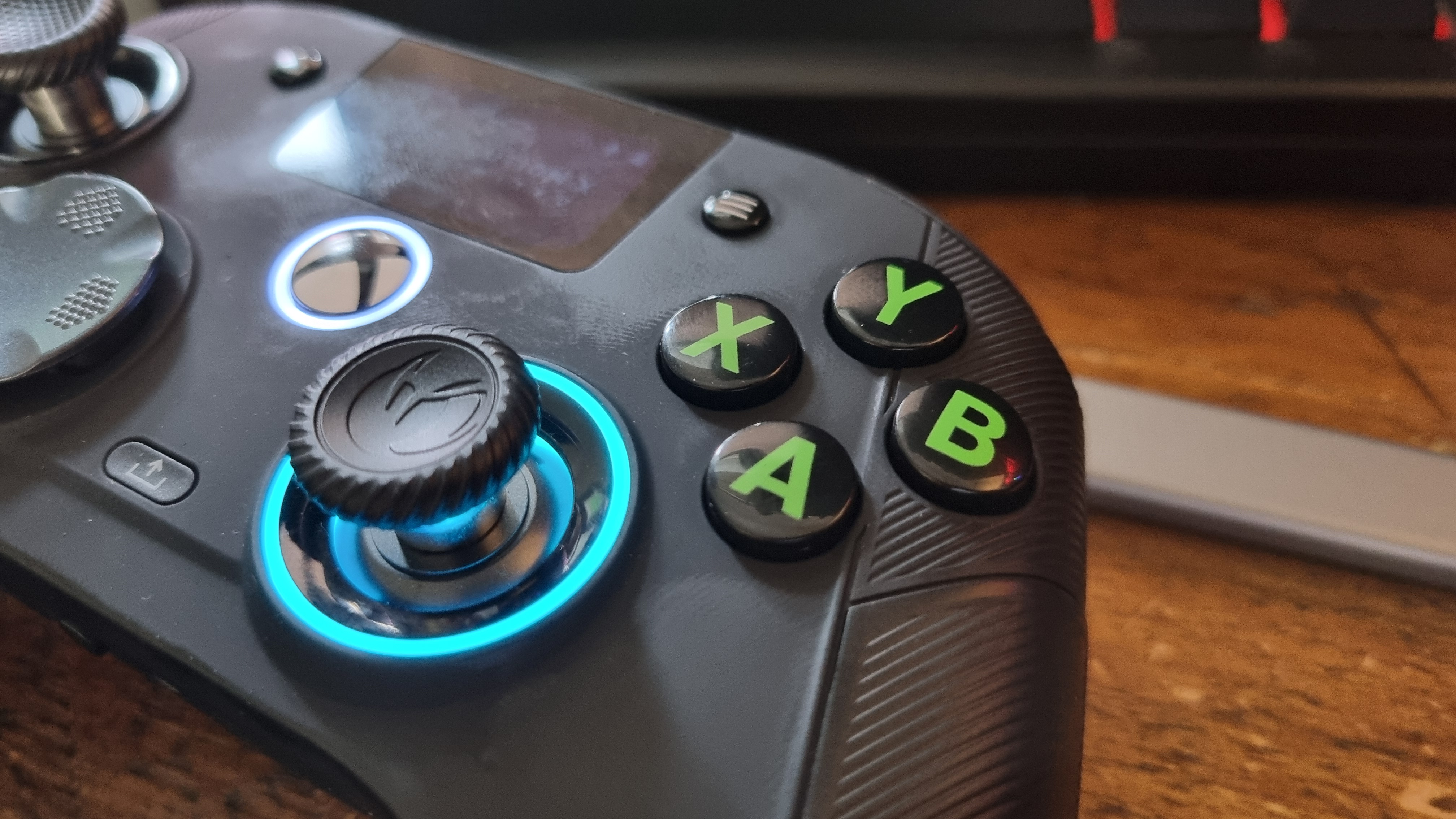 The face buttons of the Nacon Revolution X Unlimited, covered in grease