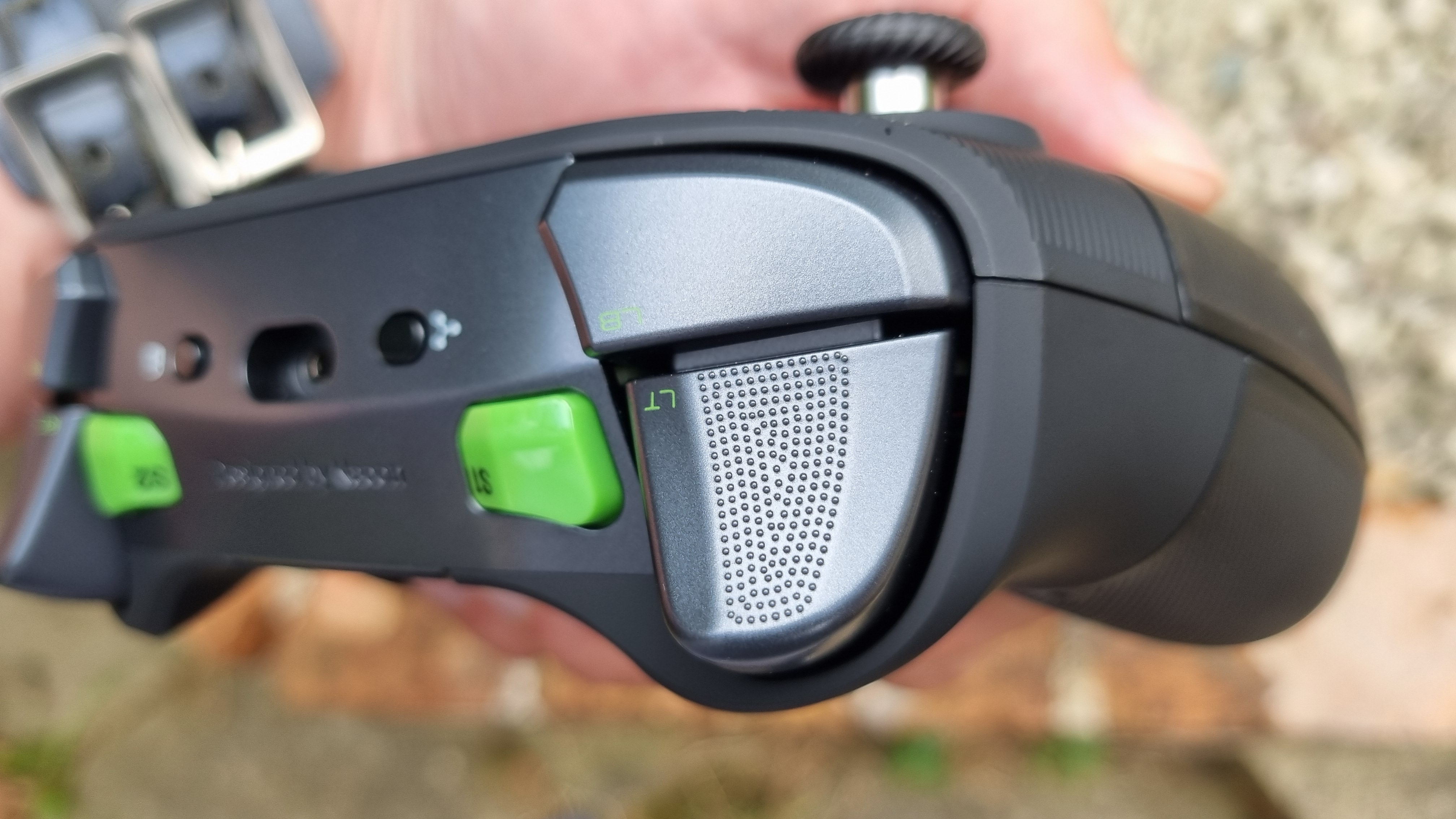 The left trigger and shoulder button of the Nacon Revolution X Unlimited