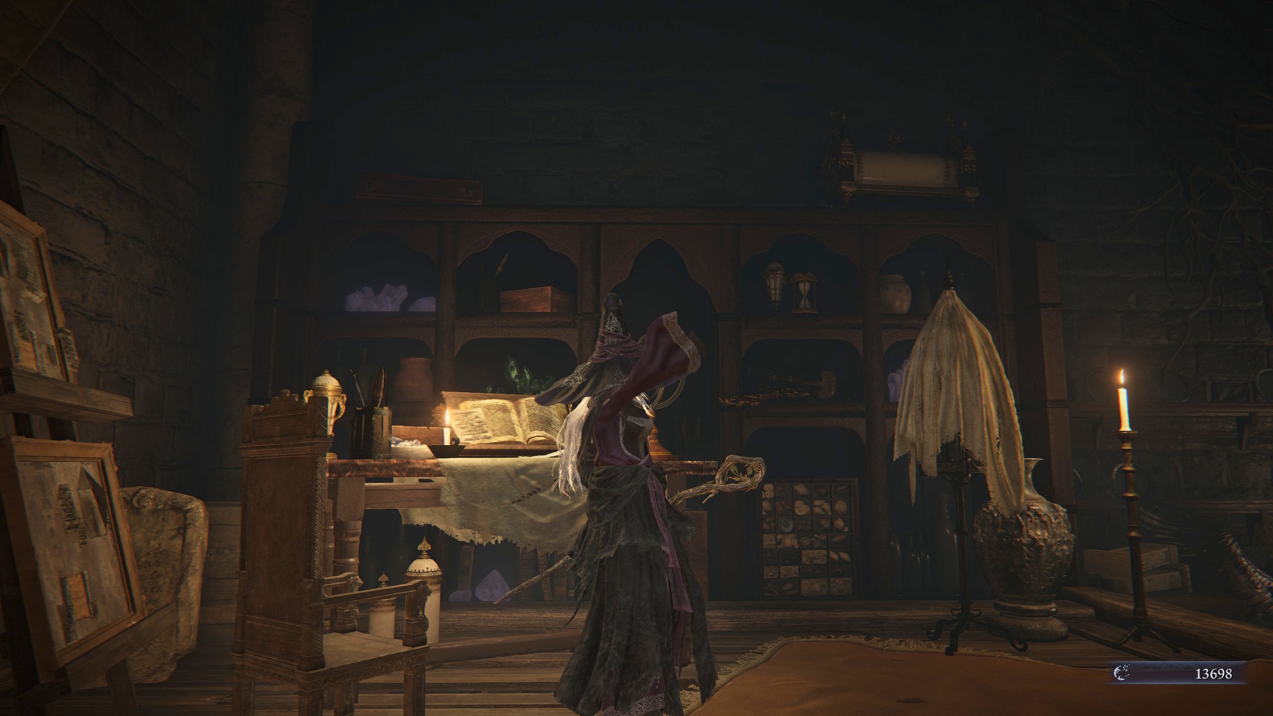 The Recluse in Elden Ring Nightreign, standing near a journal