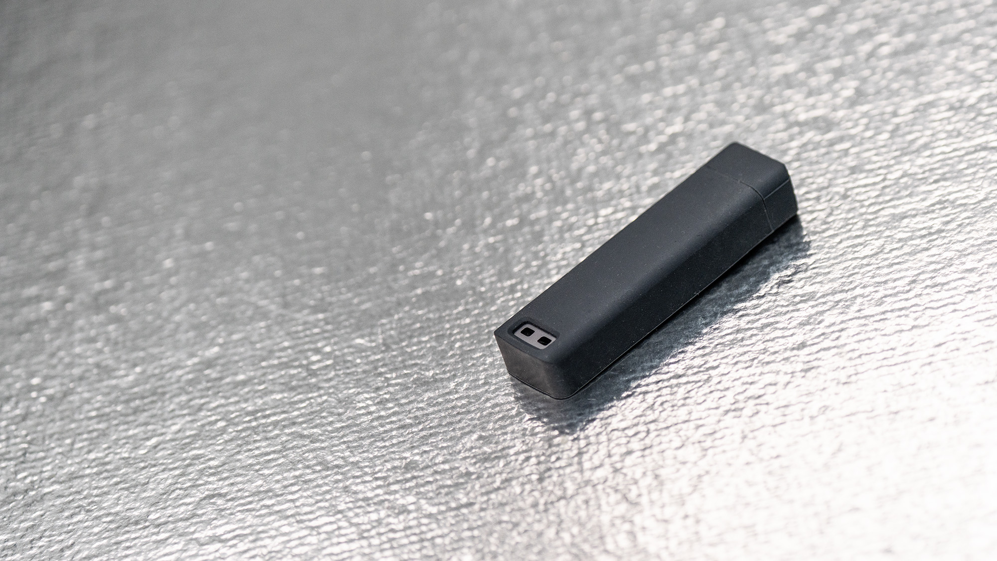 Seagate Ultra Compact SSD on a glass background.