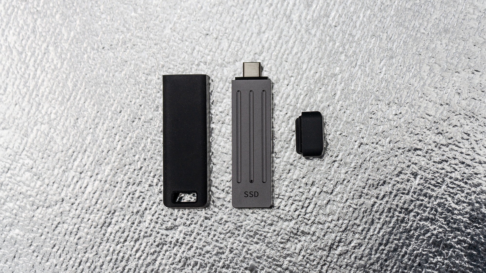 Seagate Ultra Compact SSD on a glass background.