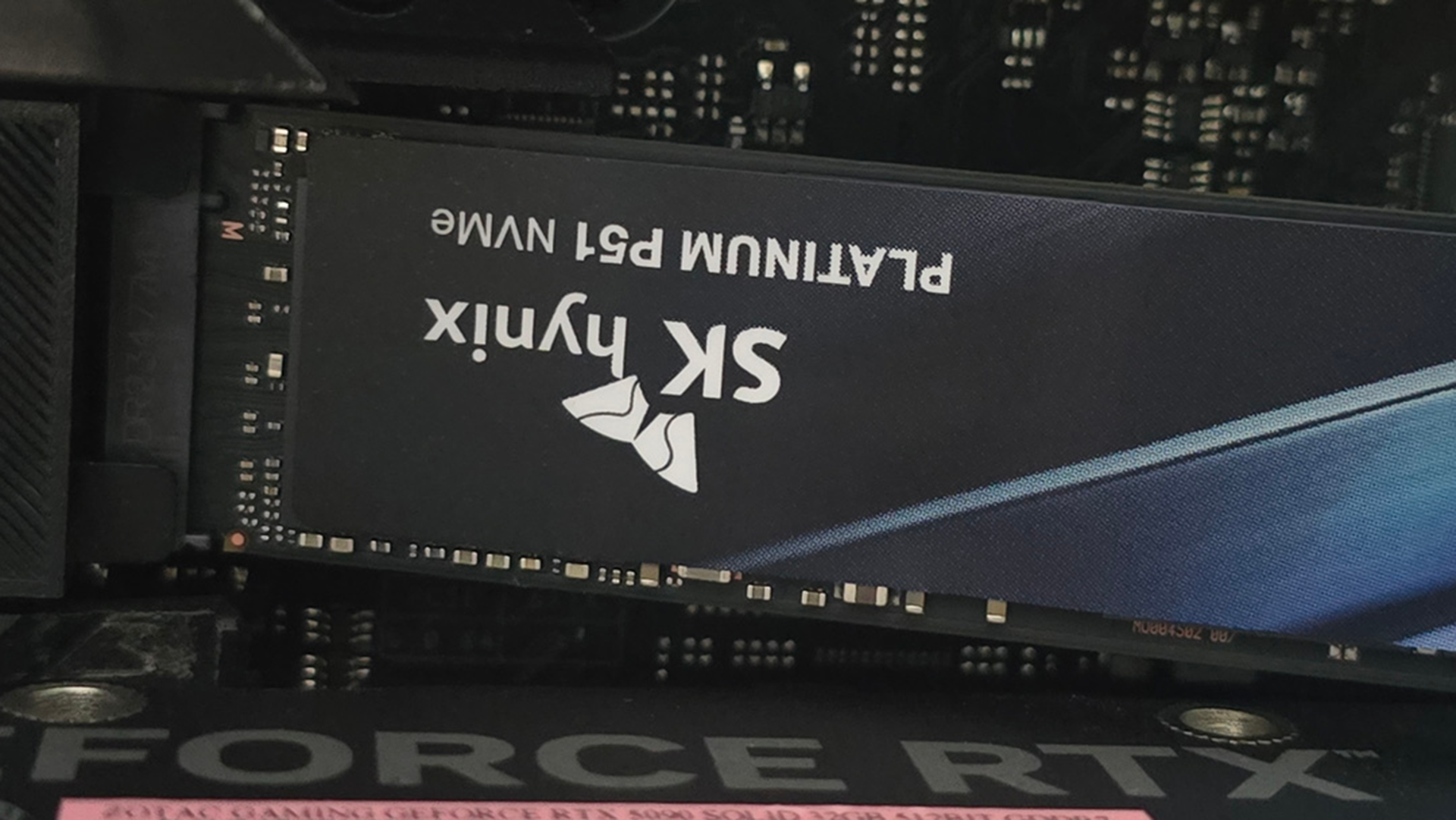 An SK Hynix Platinum P51 drive installed inside a gaming PC.