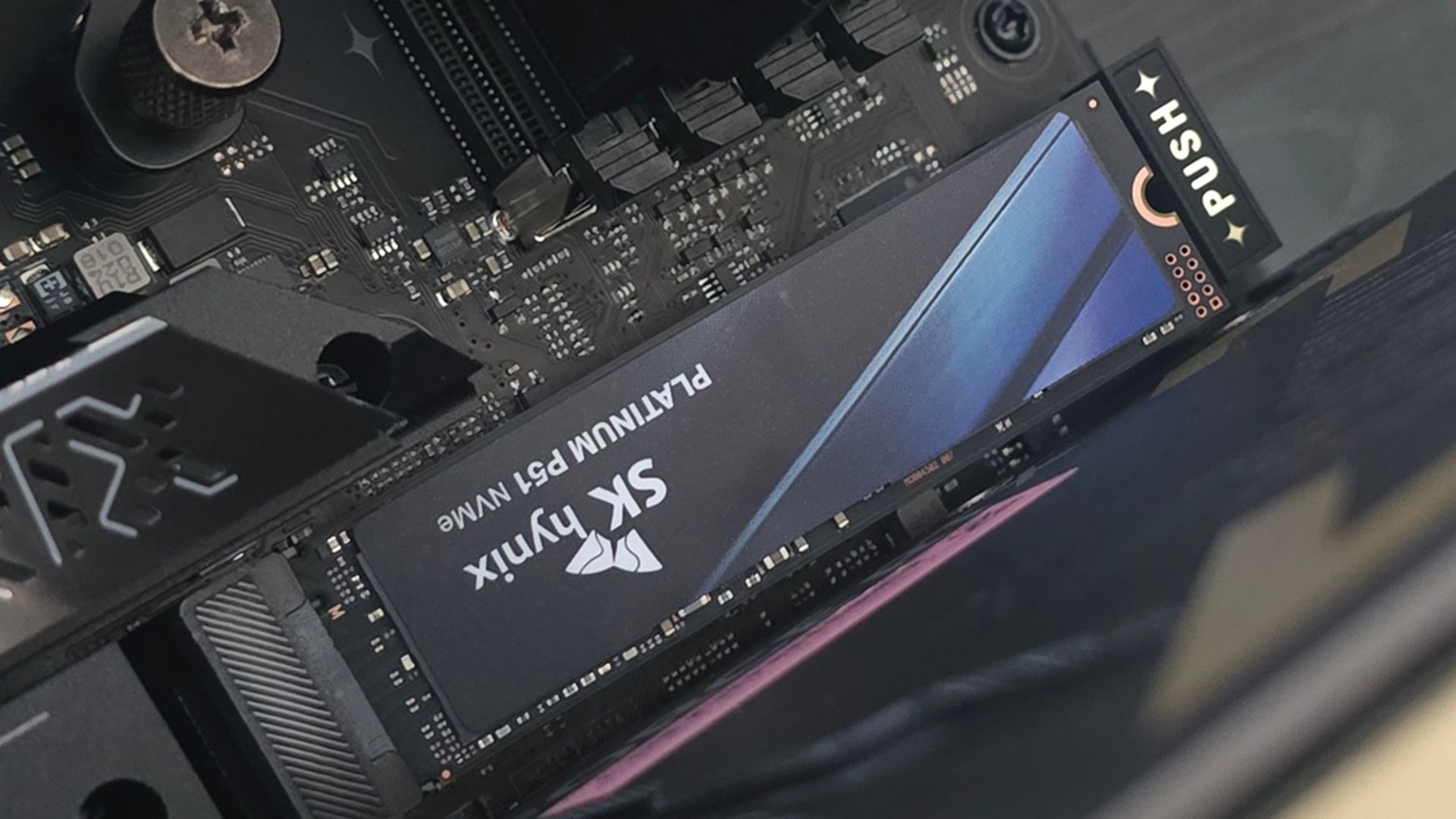 An SK Hynix Platinum P51 drive installed inside a gaming PC.