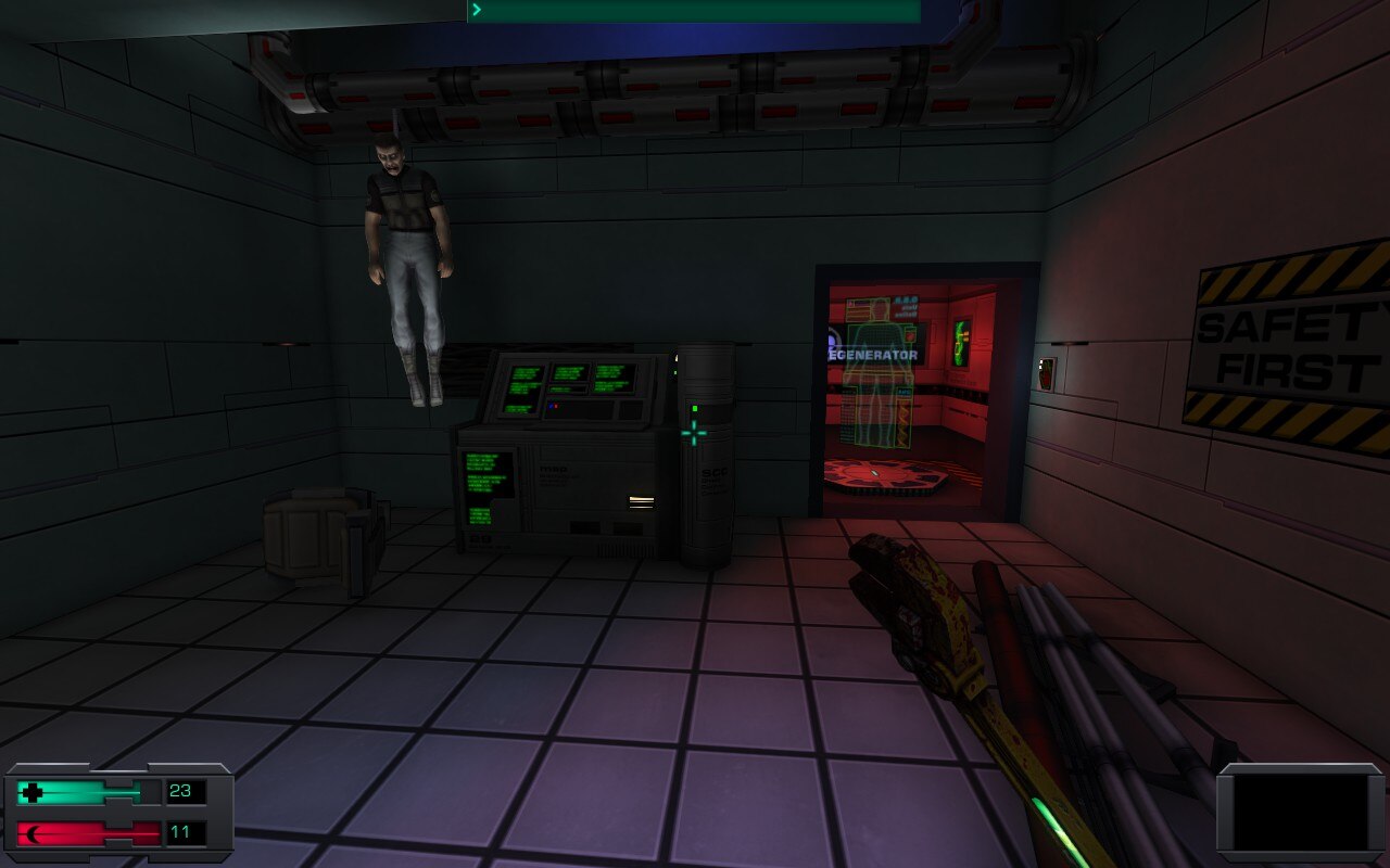 Hanged man next to computer monitor and medical cubby in System Shock 2