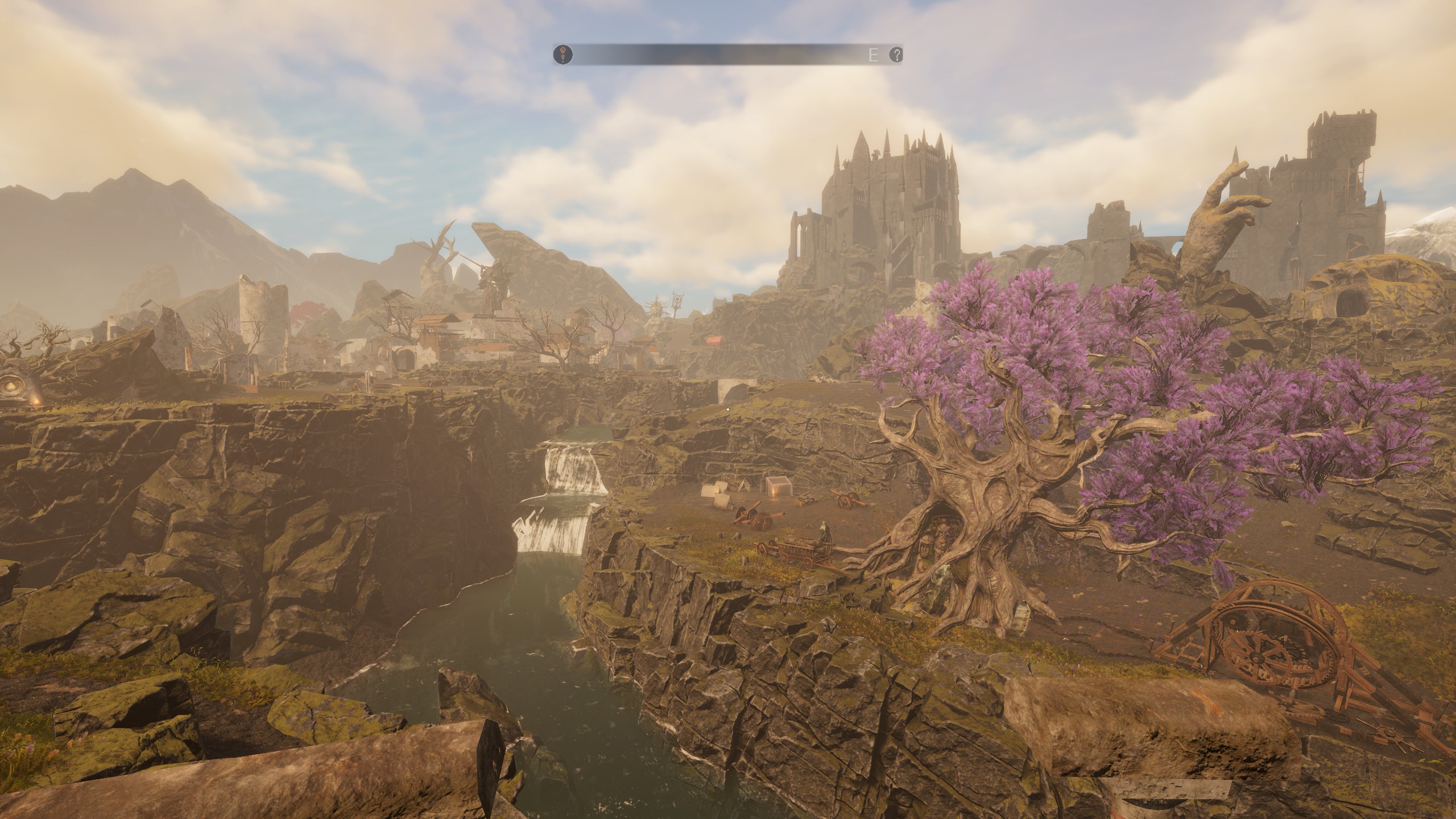 A river running through a ravine in Cuanacht, with a castle in the distance