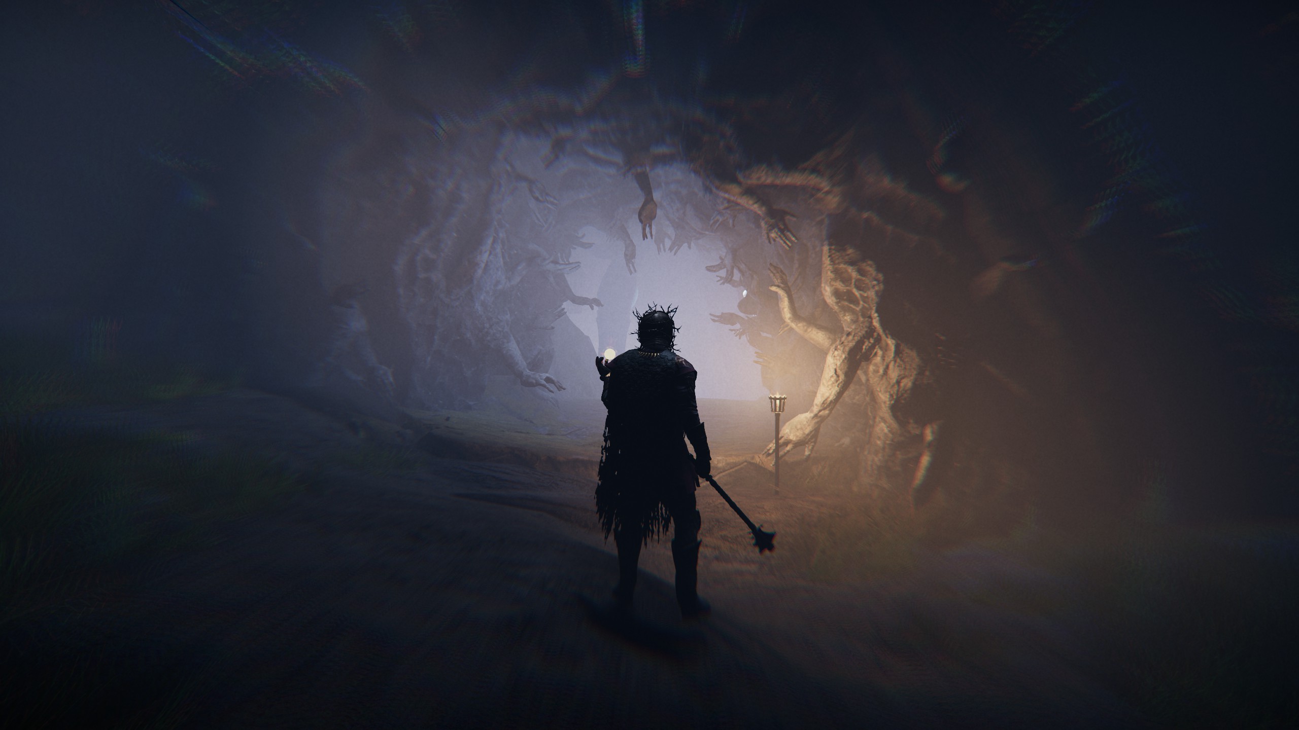 A tunnel where arms grow out of the walls