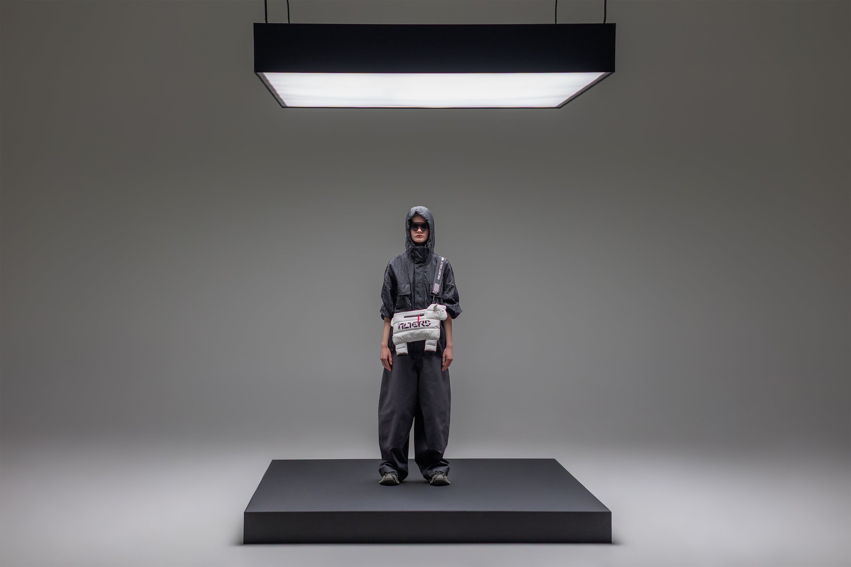 A female model wearing the Alters sheep bag.