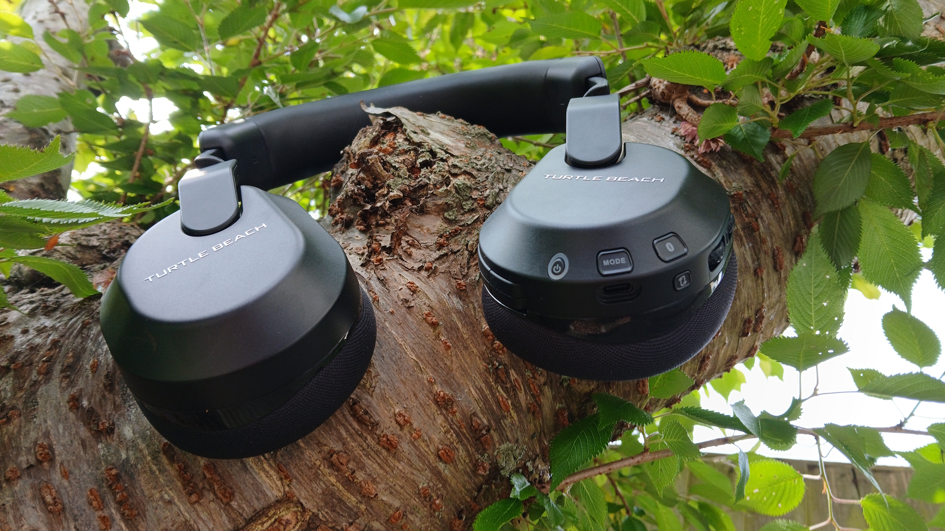The Turtle Beach Stealth 600 gaming headset outside with the microphone and buttons on show.