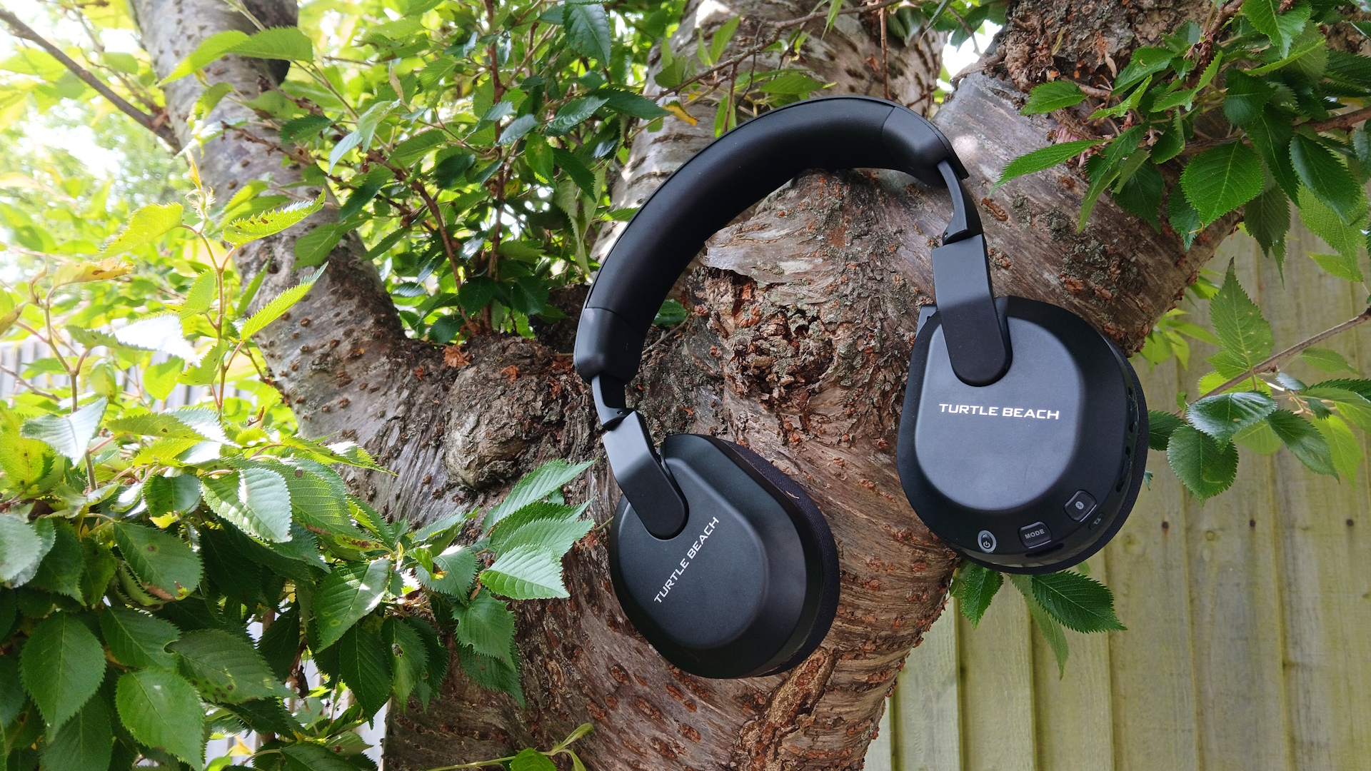 The Turtle Beach Stealth 600 gaming headset outside with the microphone and buttons on show.