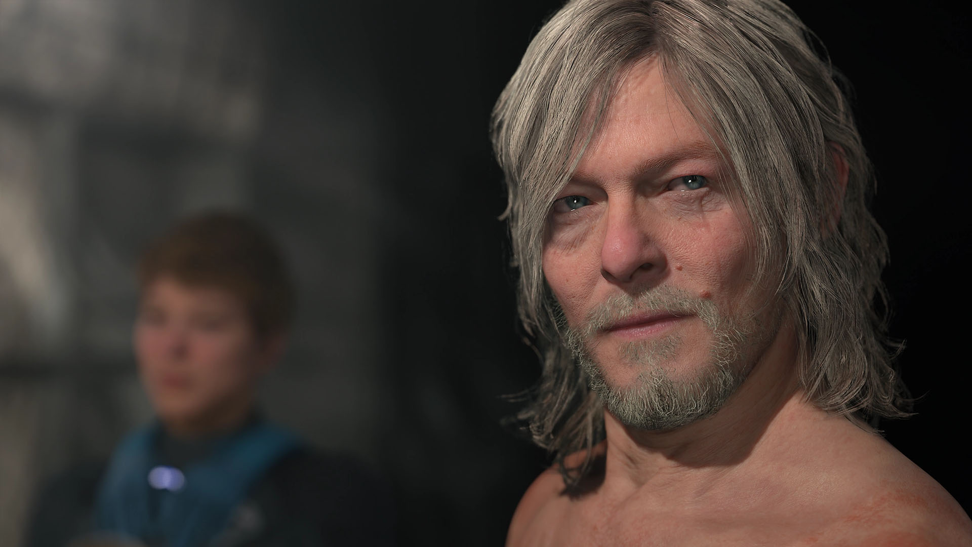 A Death Stranding 2 screenshot showing Sam, Norman Reedu’s character, facing the camera.