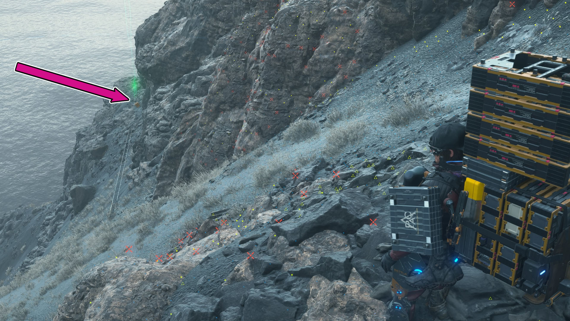 A Death Stranding 2 screenshot showing a cliff and a ladder working as a bridge to reach a distant portion of the cliff. A Death Stranding 2 screenshot showing a cliff and a ladder working as a bridge to reach a distant portion of the cliff.