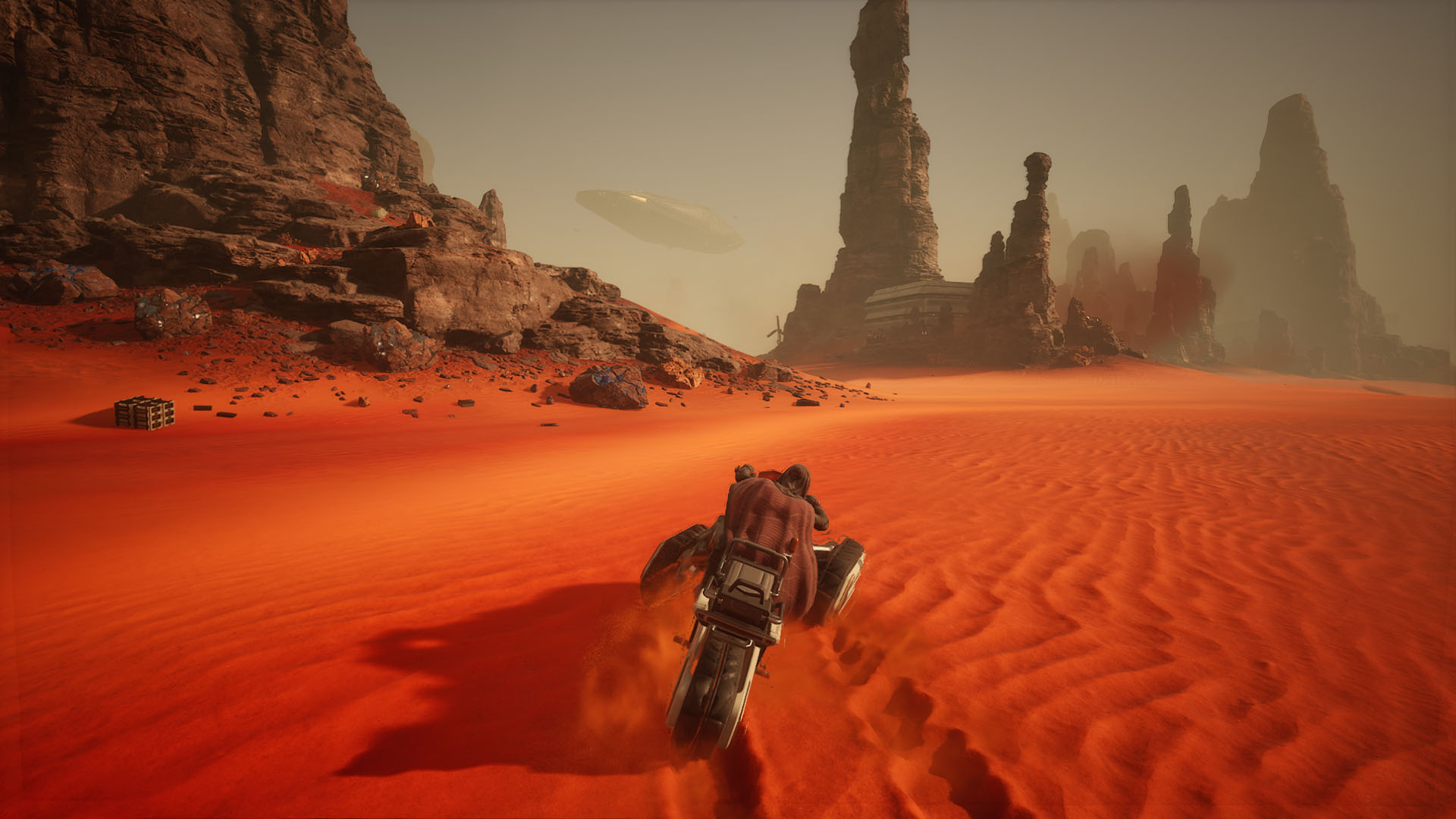 A Dune: Awakening screenshot showing a character riding a bike in Arrakis