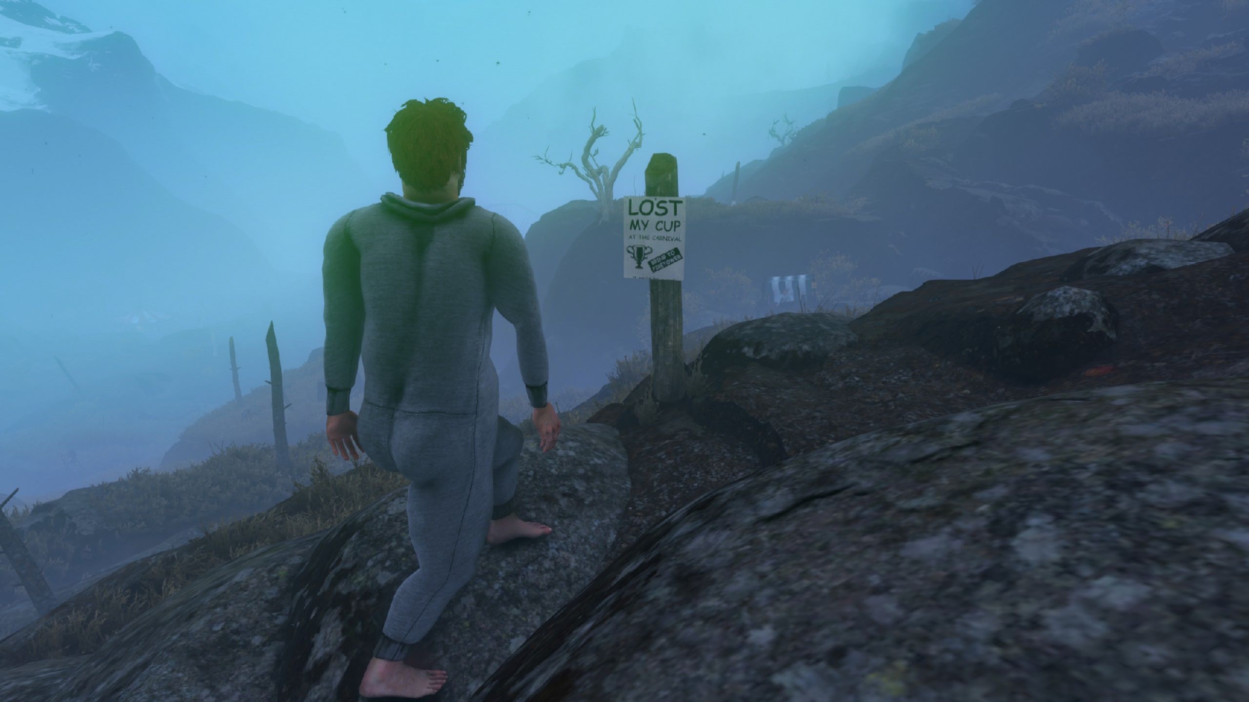 Nate walks past a sign for a lost cup