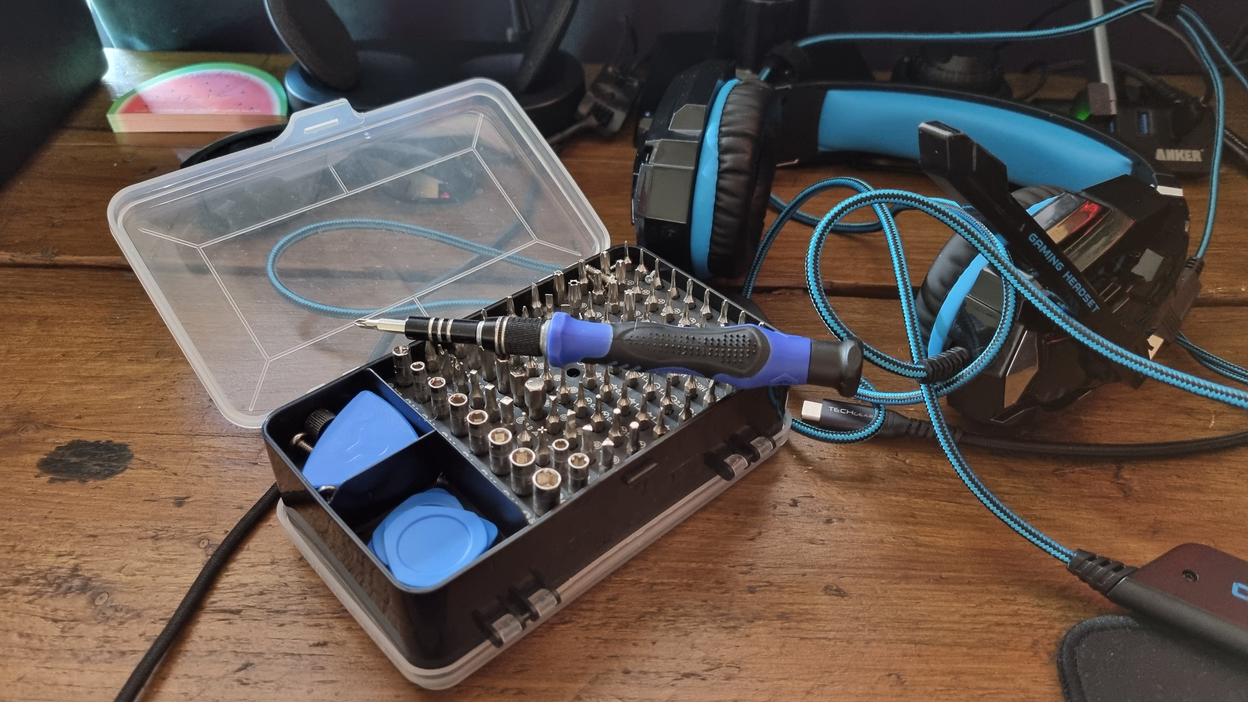 The Bengoo G9000 gaming headset next to a screwdriver set