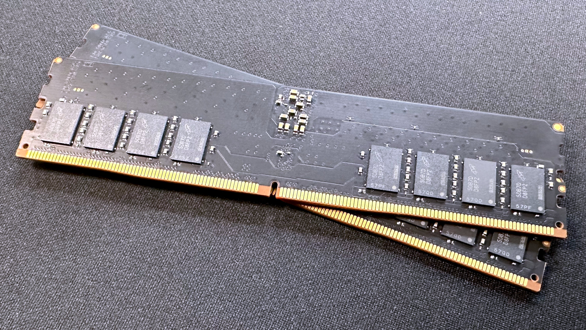 A photo of a 128 GB Crucial DDR5-6400 CUDIMM kit.