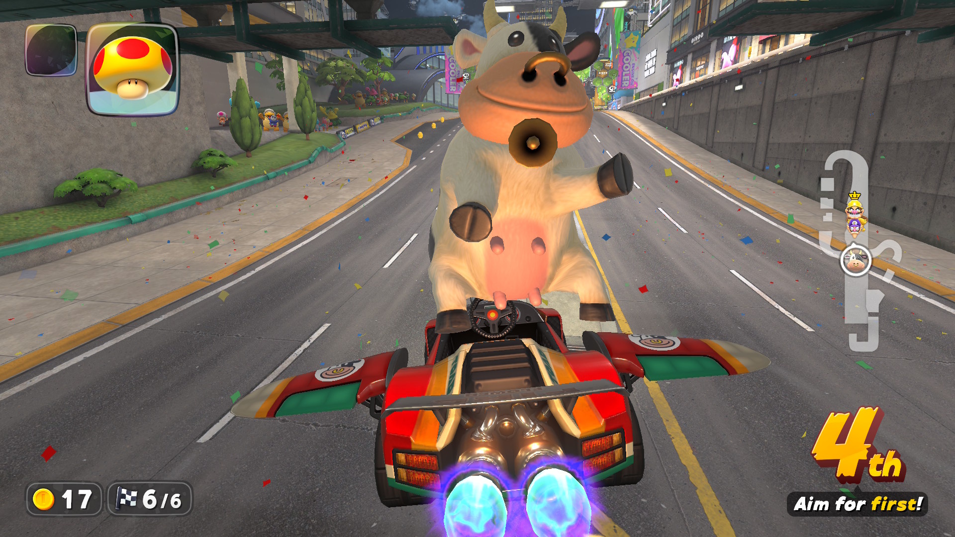 The cow in Mario Kart World, posing on her hind legs while standing up in a car that’s flying like a plane The cow in Mario Kart World, posing on her hind legs while standing up in a car that’s flying like a plane