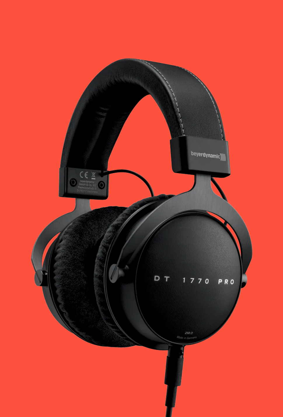 The Beyerdynamic DT 1770 PRO MKII floats in a colourful orange void.