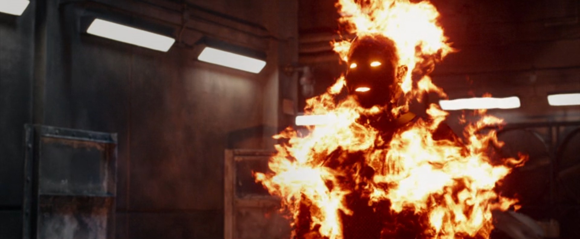 The Human Torch, played in the flesh by Michael B. Jordan, lights himself on fire in a scene from the 2015 Fantastic Four. The Human Torch, played in the flesh by Michael B. Jordan, lights himself on fire in a scene from the 2015 Fantastic Four.