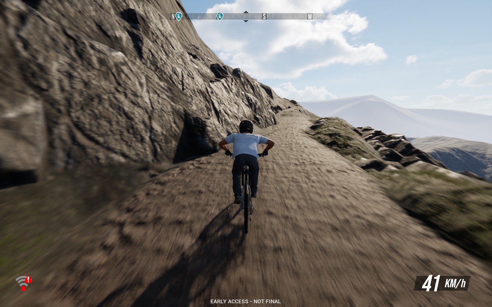 A screenshot from Mavrix by Matt Jones showing a man on a bike riding uphill