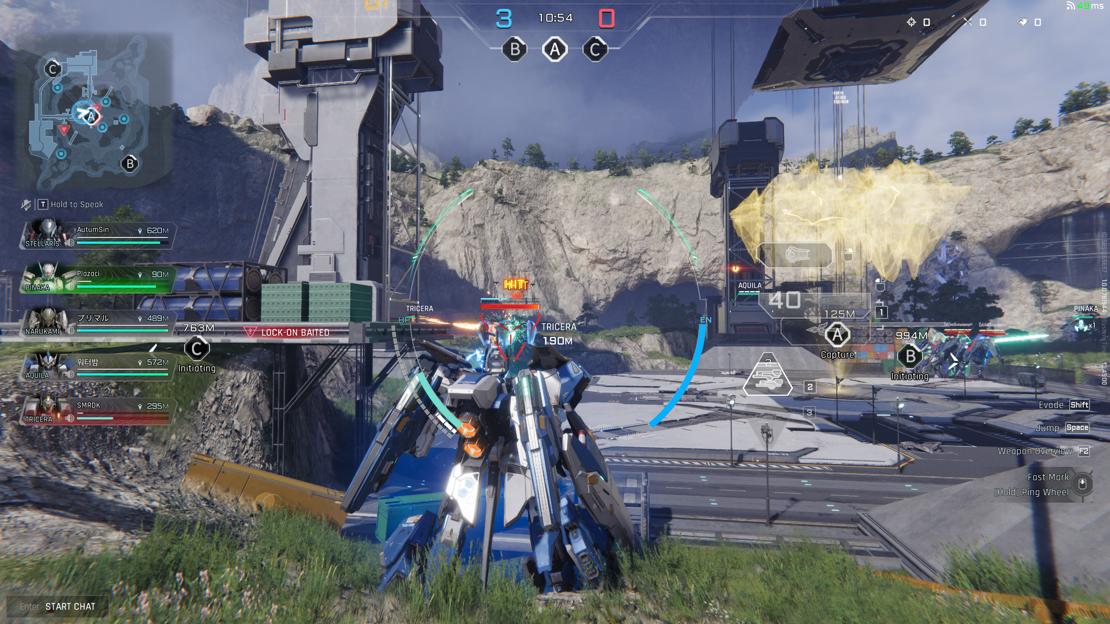 A blue and white mech stands before an objective in Mecha Break in broad daylight