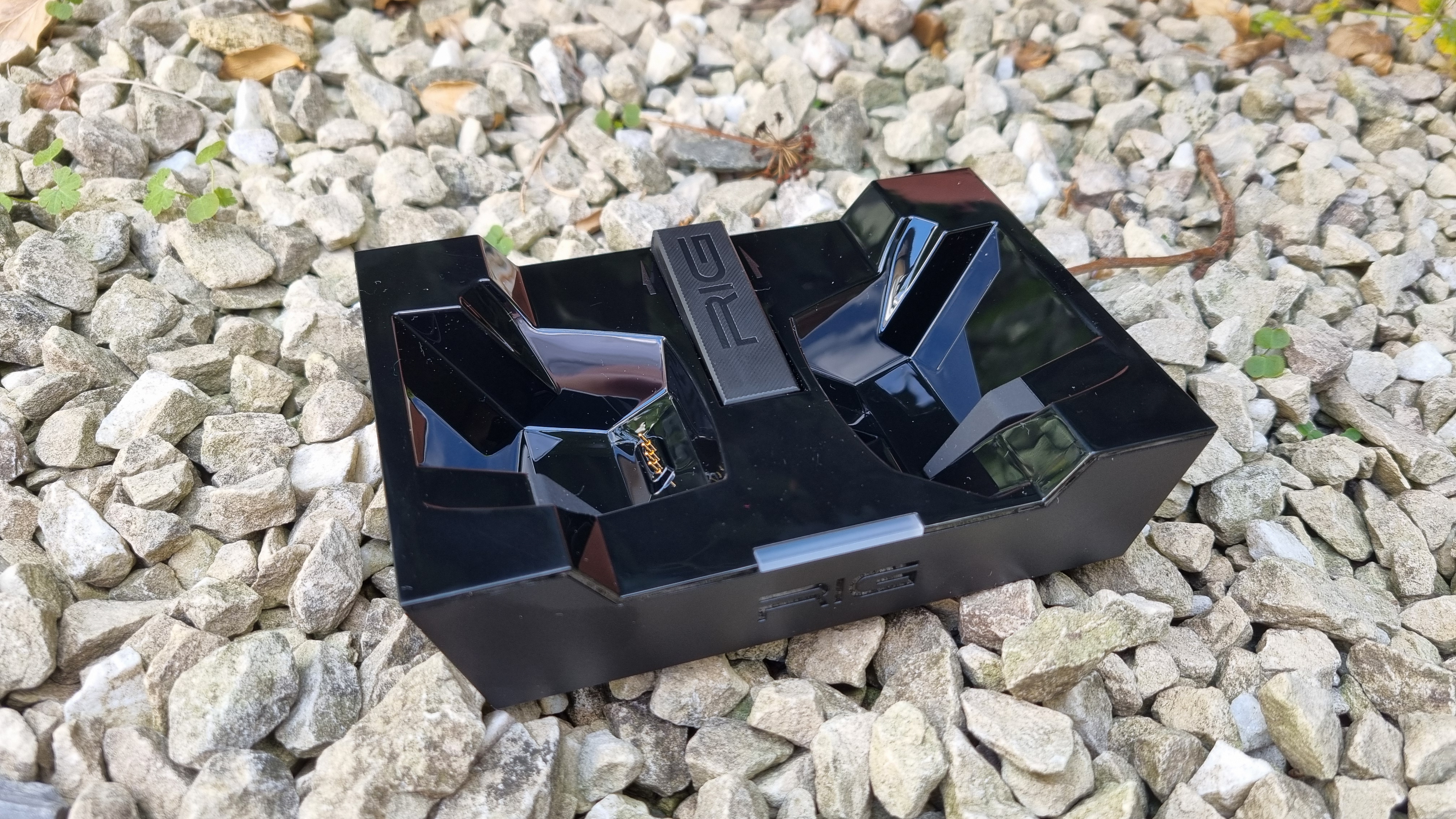 The Nacon RIG 900 Max HS gaming headset with charging cradle