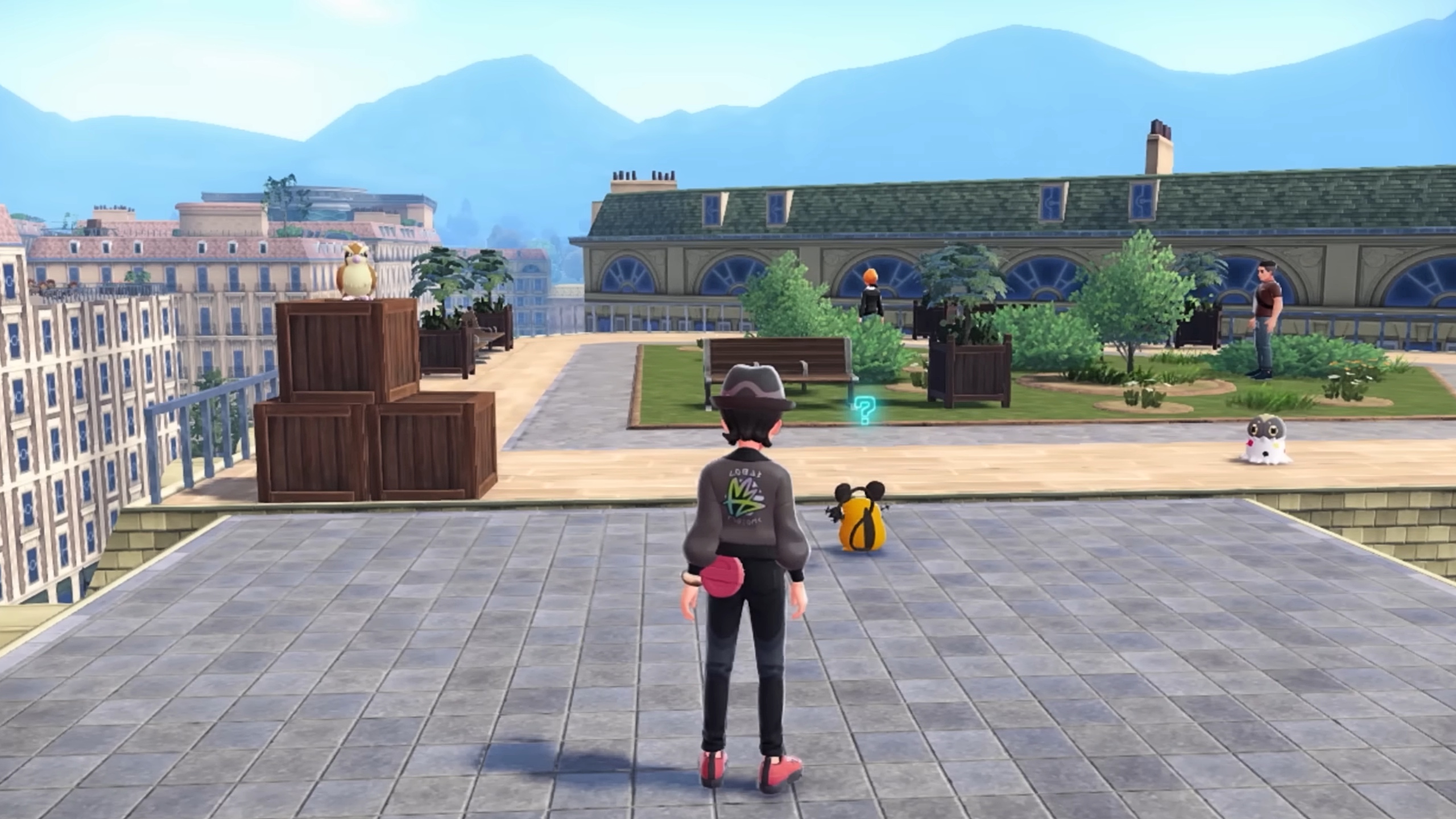 A Pokemon trainer in Legends Z-A approaching two Pokemon on a roof, both of whom are just standing there A Pokemon trainer in Legends Z-A approaching two Pokemon on a roof, both of whom are just standing there