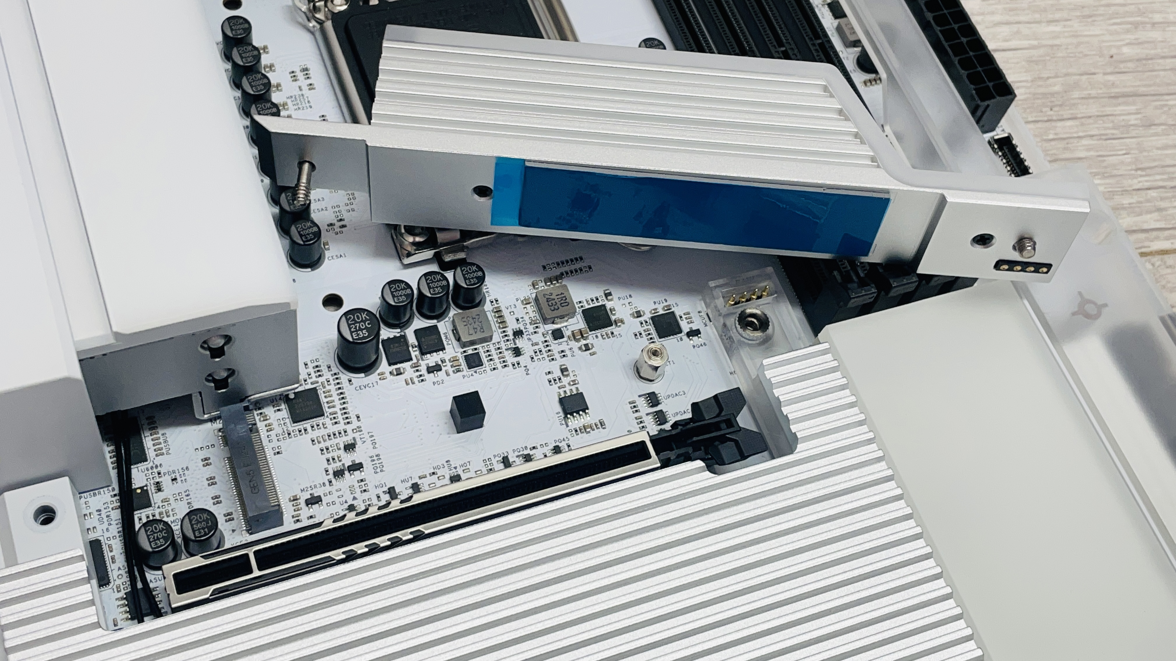 An NZXT N9 Z890 motherboard on a desk with port covers removed.