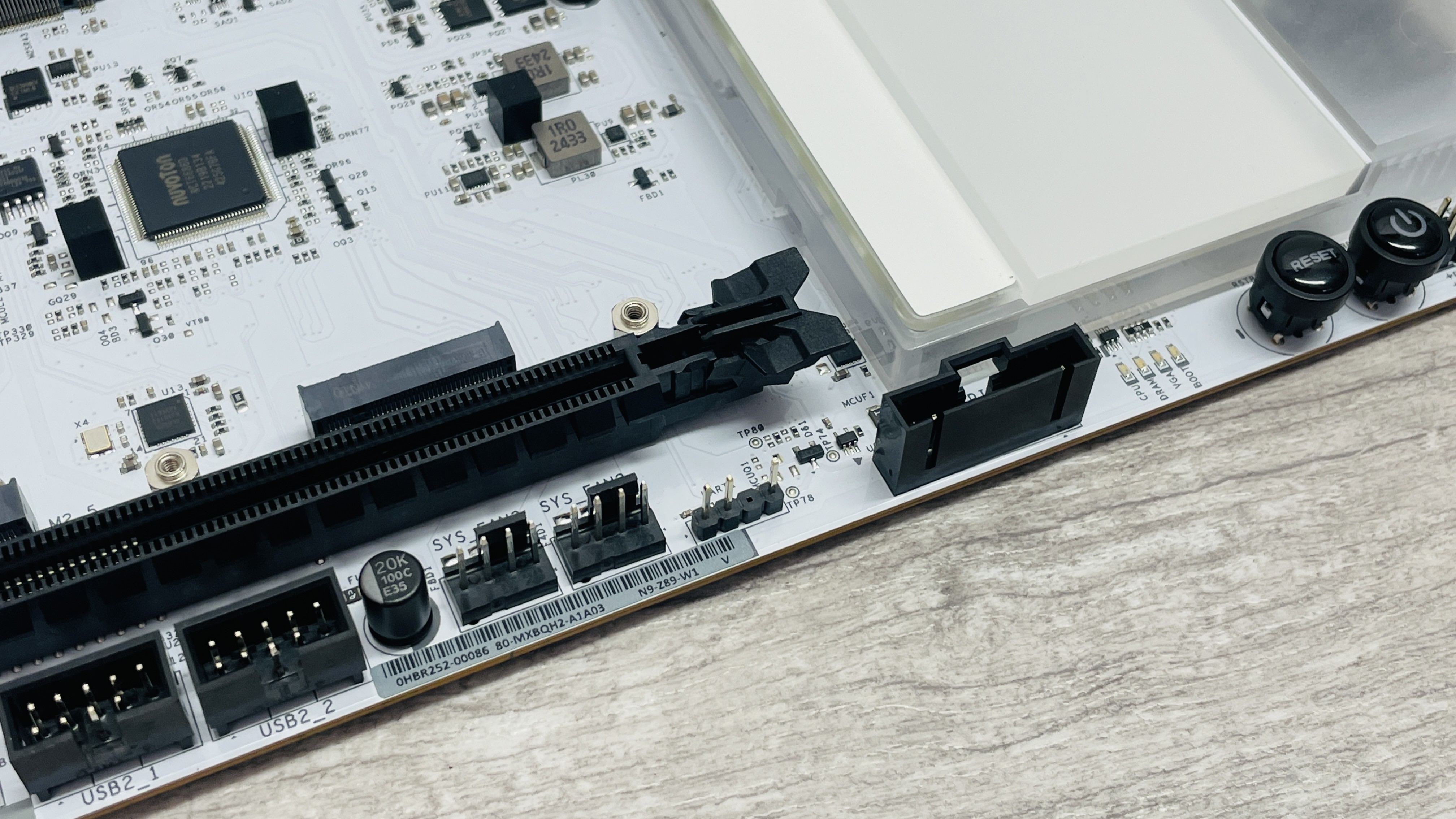 An NZXT N9 Z890 motherboard on a desk with port covers removed.