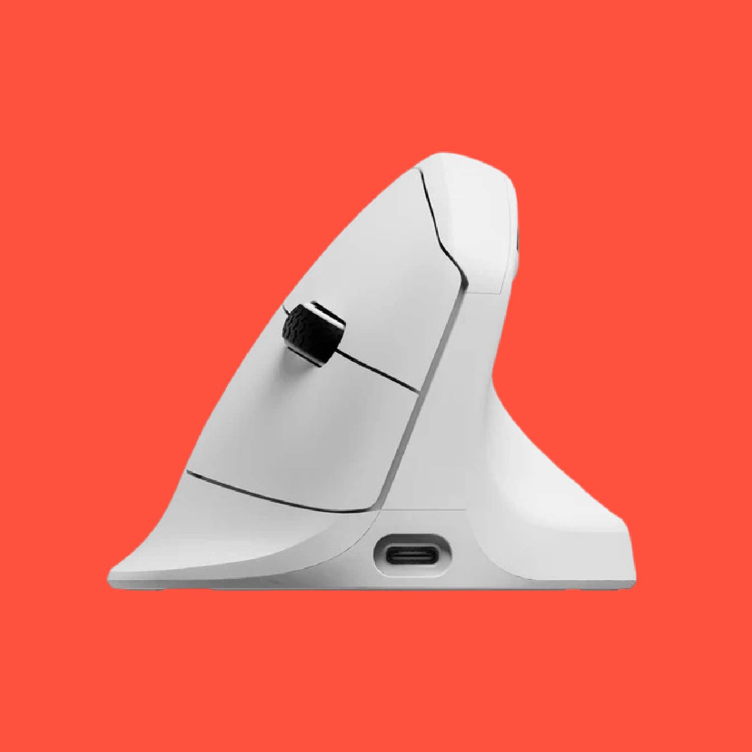 Keychron M5 mouse on a red background