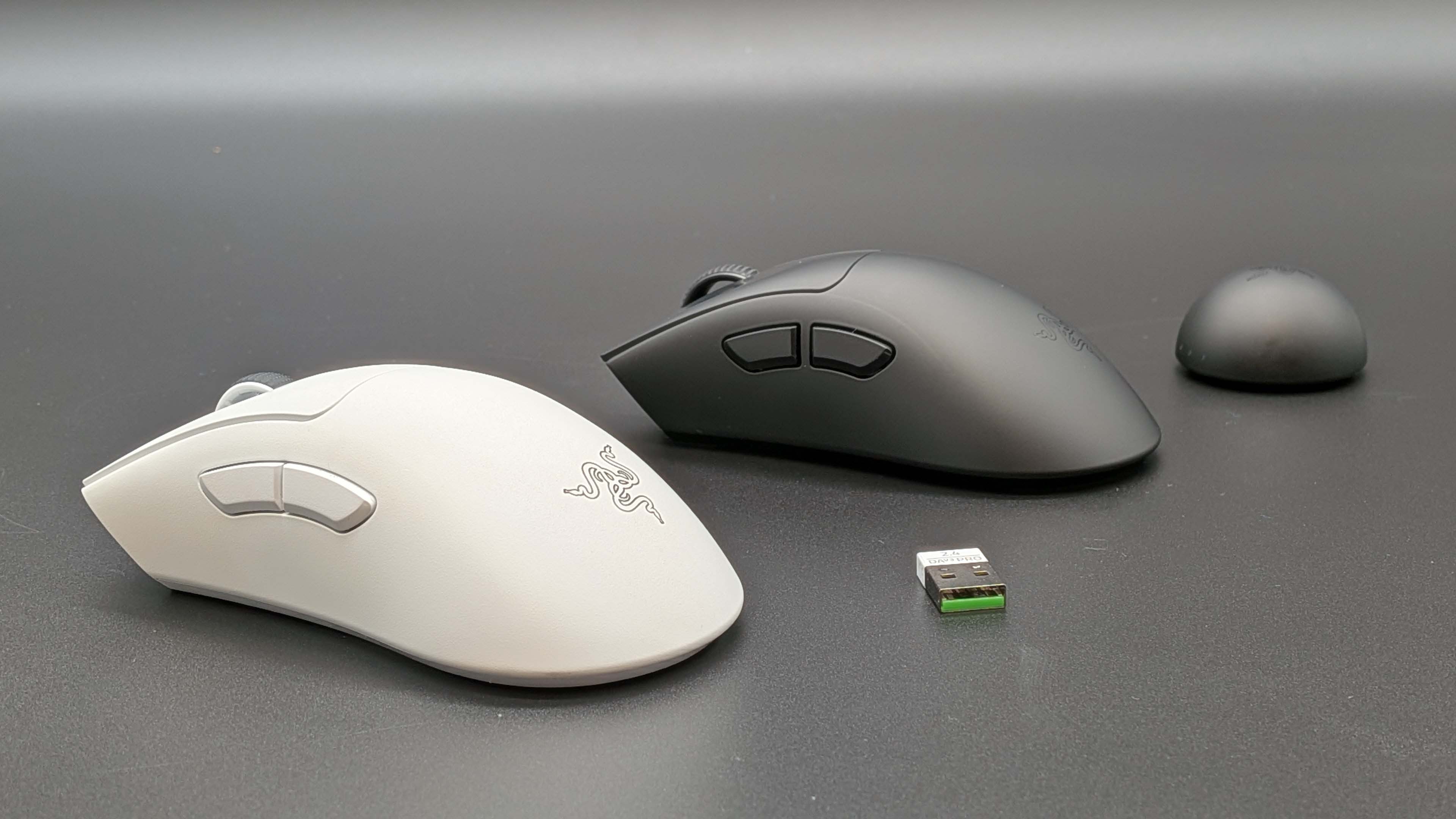 Razer DeathAdder V4 Pro and white V3 Pro gaming mice