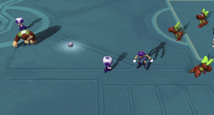 Toad rams Donkey Kong into the ground in Super Mario Strikers