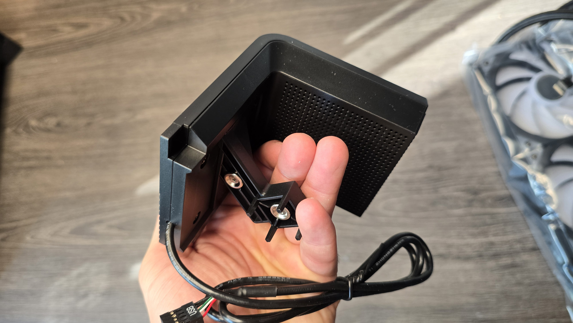 A Tryx all-in-one liquid cooler with a large screen over the pump unit.