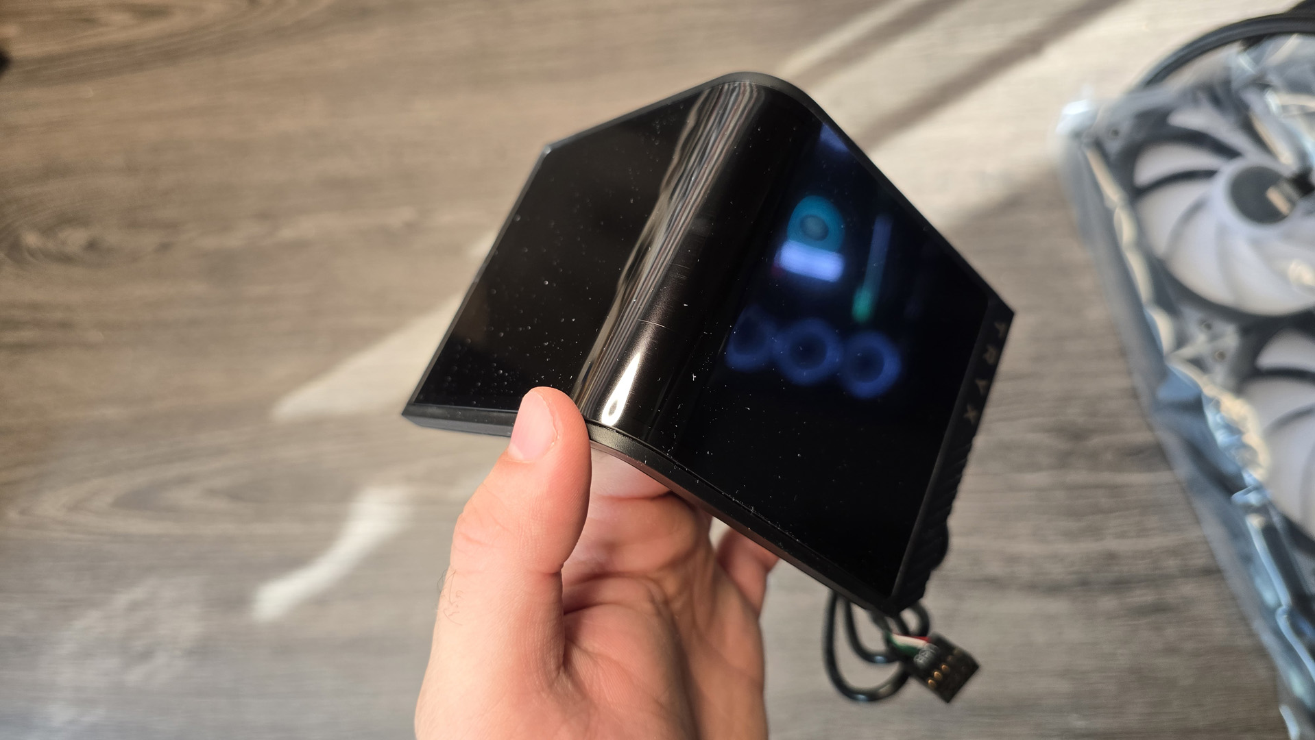 A Tryx all-in-one liquid cooler with a large screen over the pump unit.