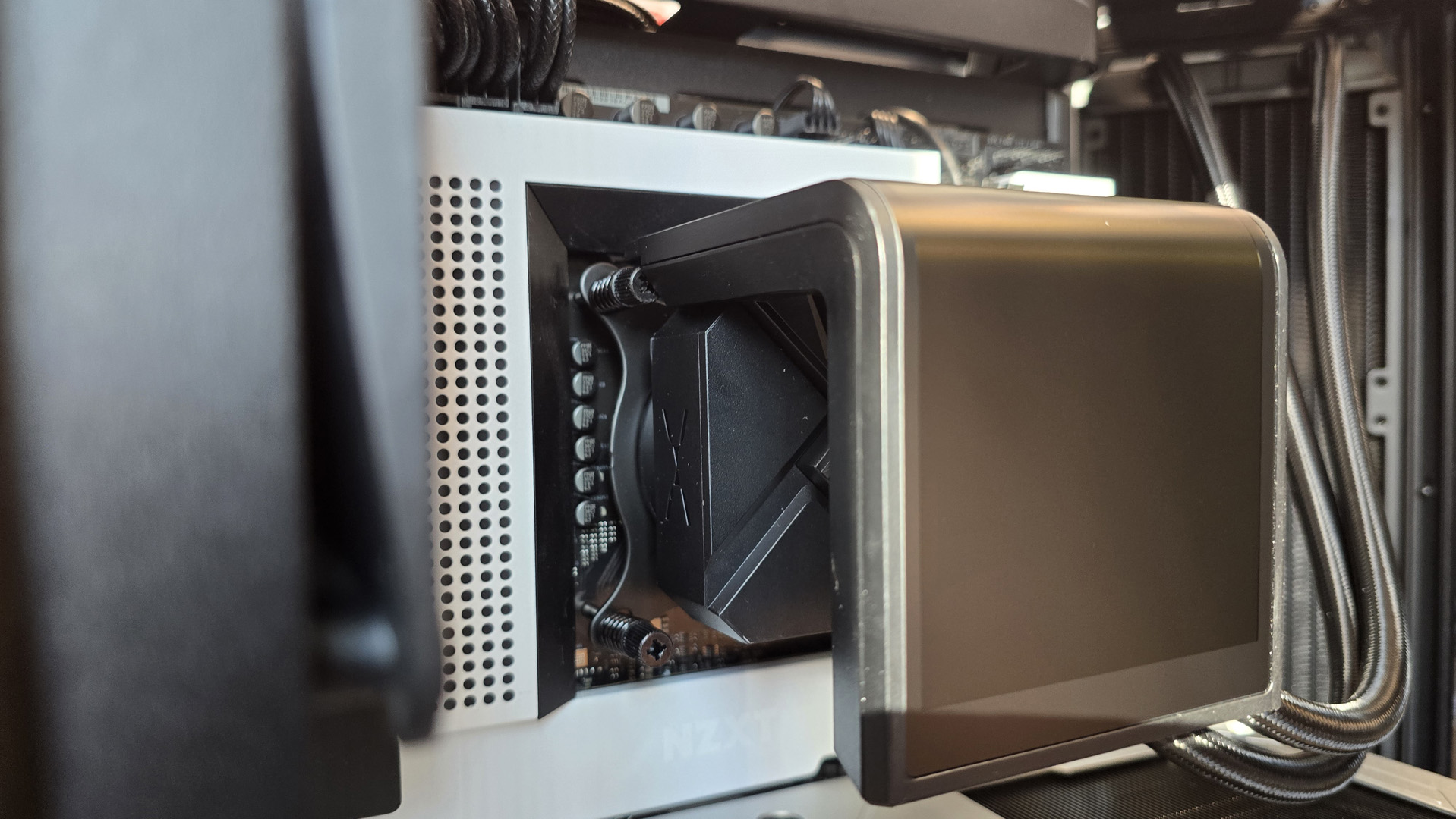 A Tryx all-in-one liquid cooler with a large screen over the pump unit.