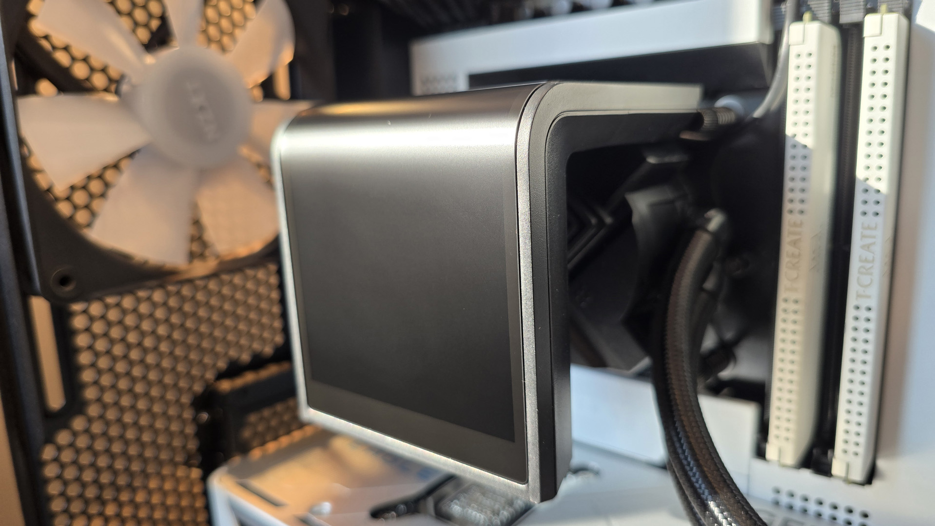 A Tryx all-in-one liquid cooler with a large screen over the pump unit.