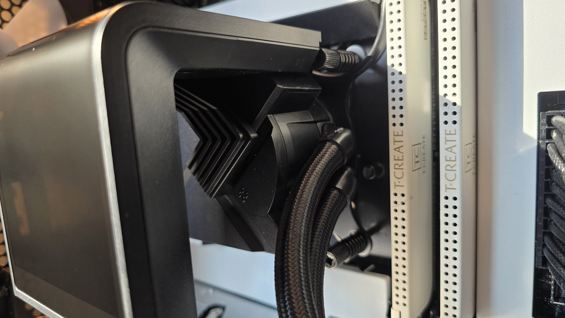 A Tryx all-in-one liquid cooler with a large screen over the pump unit.