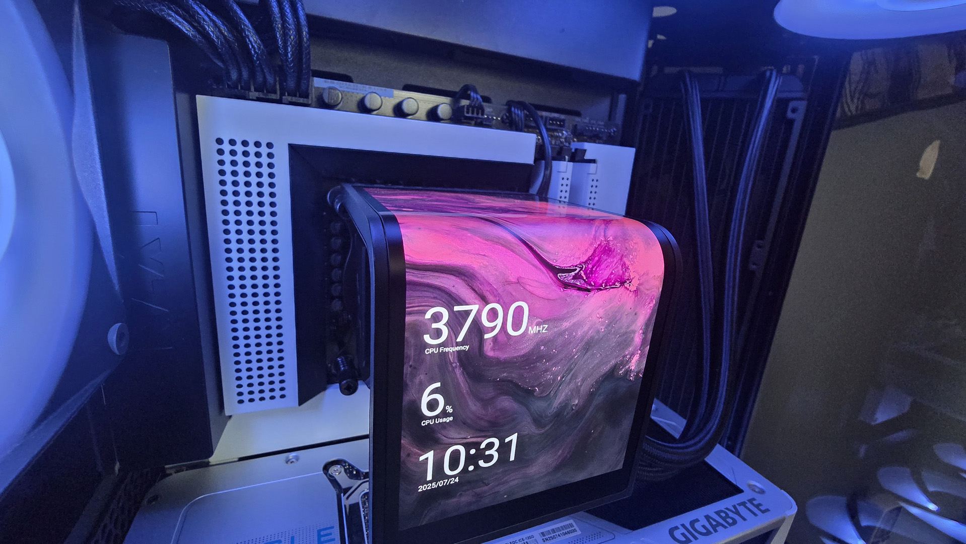 A Tryx all-in-one liquid cooler with a large screen over the pump unit.