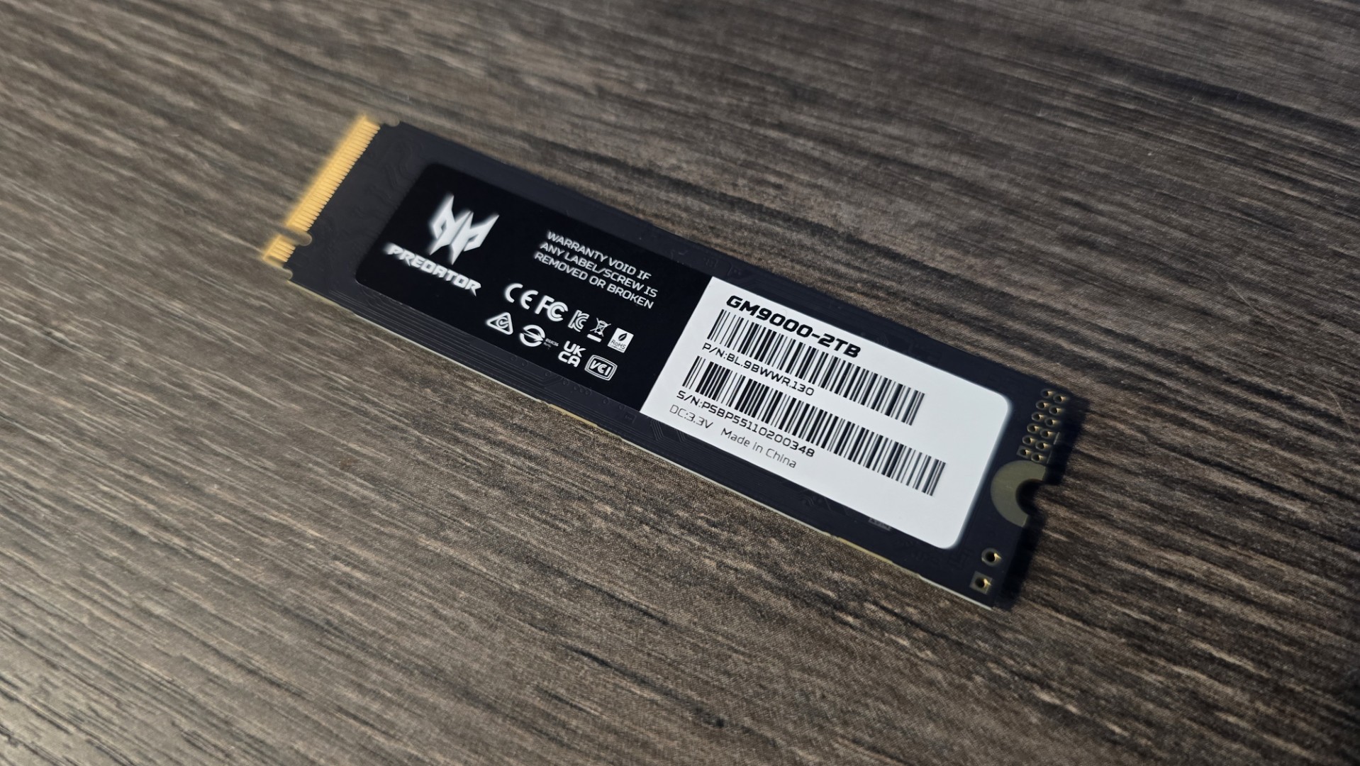 An Acer SSD on a desk and ready to be installed in a gaming PC.