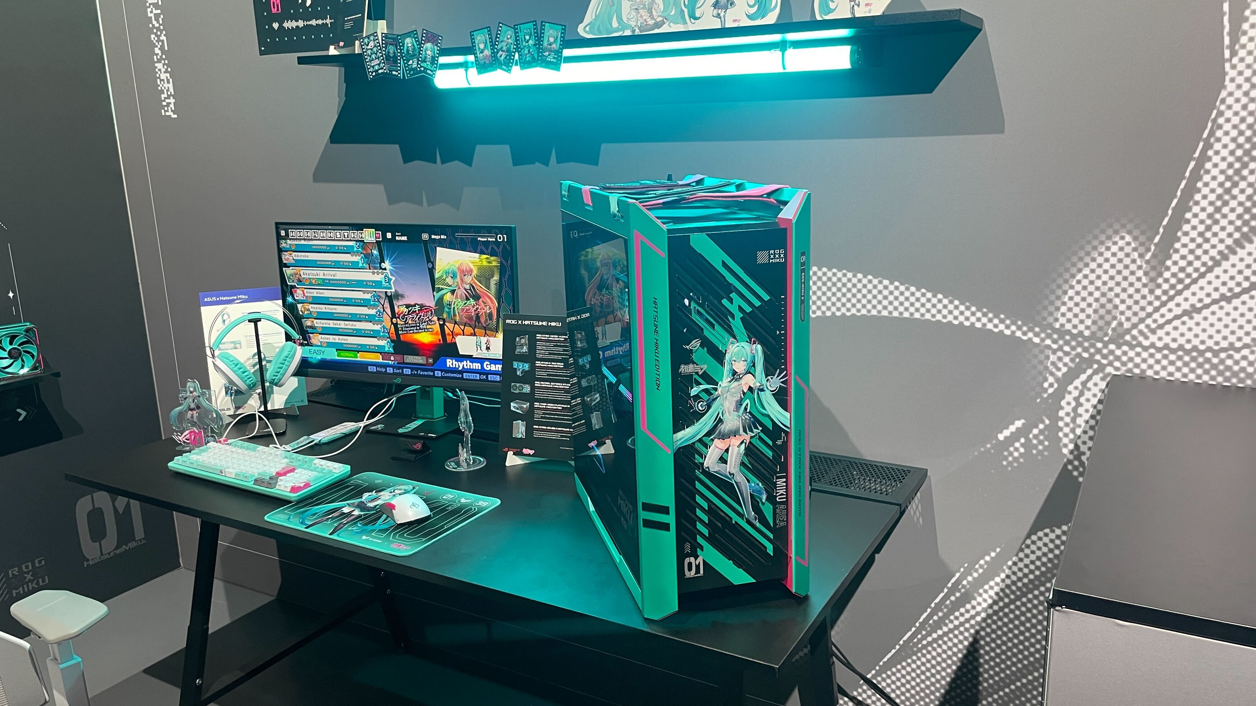 A showroom featuring many peripherals and bits of hardware from the Asus x Hatsune Miku collaboration.