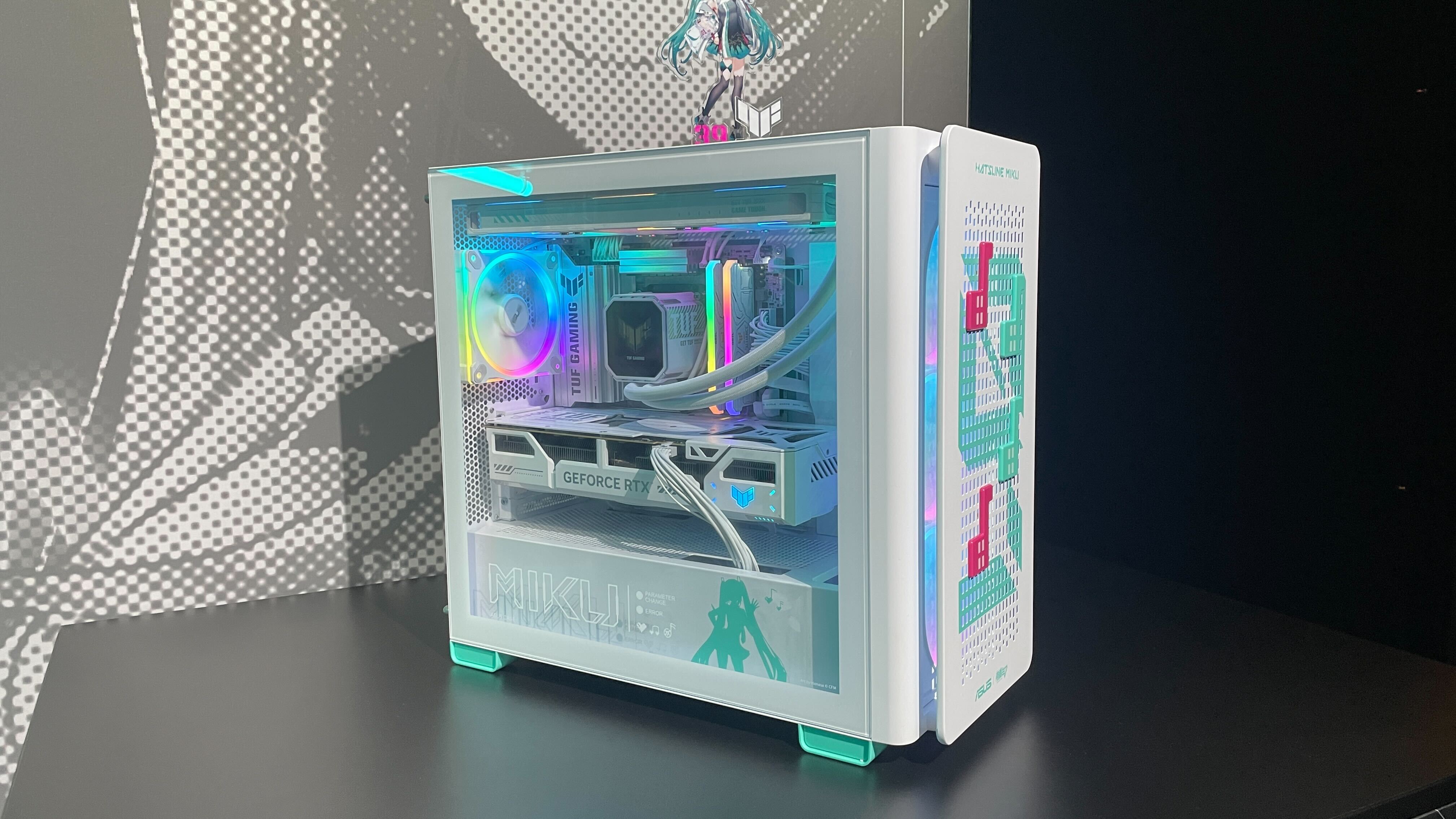 A showroom featuring many peripherals and bits of hardware from the Asus x Hatsune Miku collaboration.