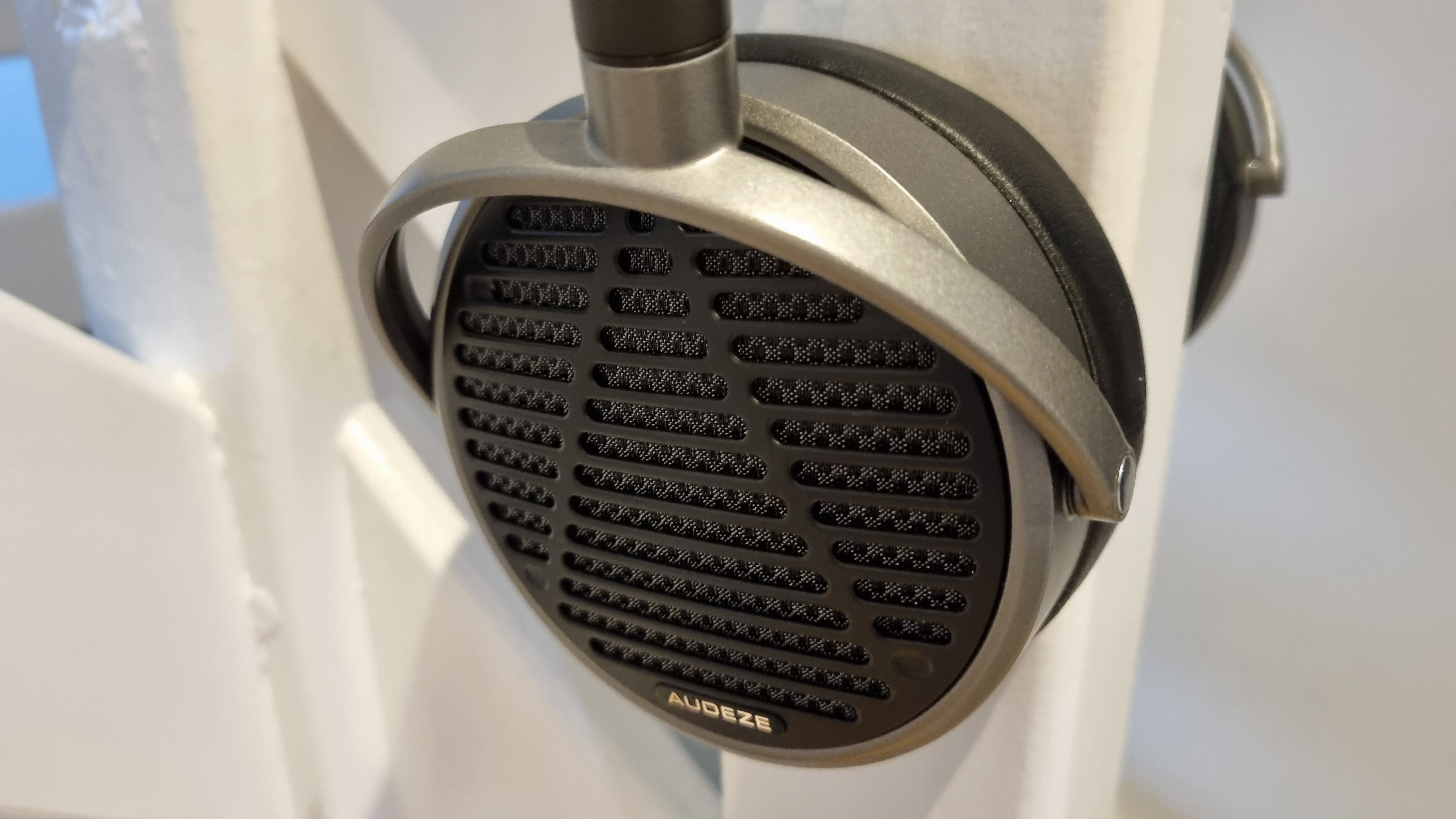 The outer earcups of the Audeze MM-100