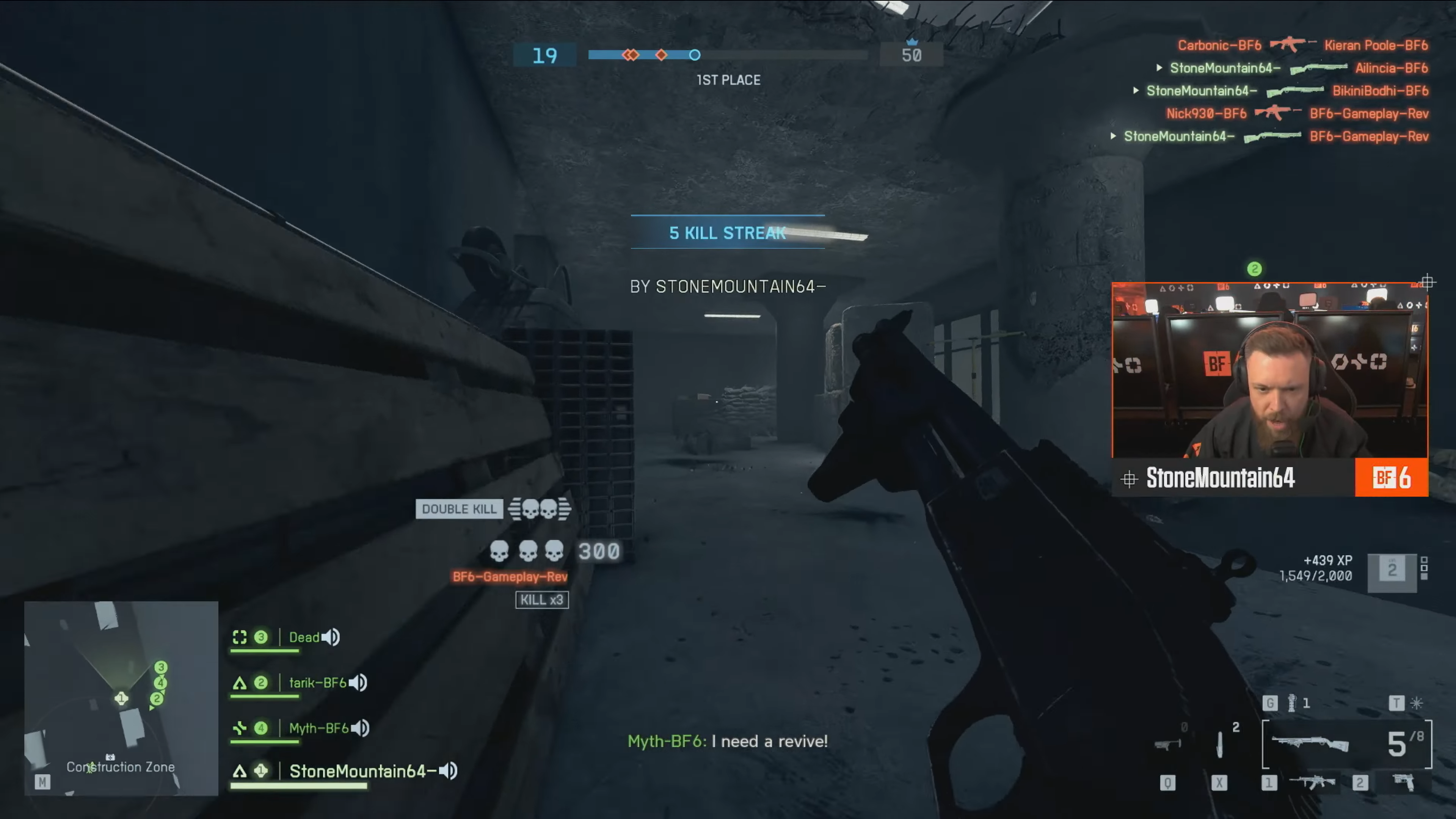 Streamer StoneMountain64 achieves a 5 killstreak with a shotgun in the Battlefield 6 multiplayer reveal.