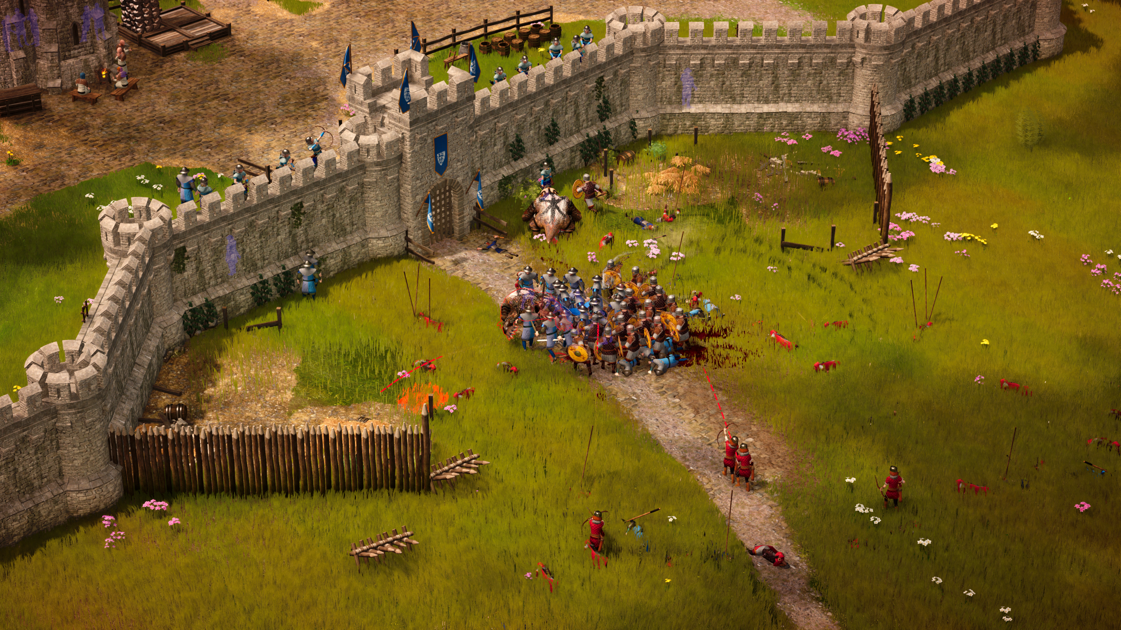 A battle at the gates of a castle in Dinolords.