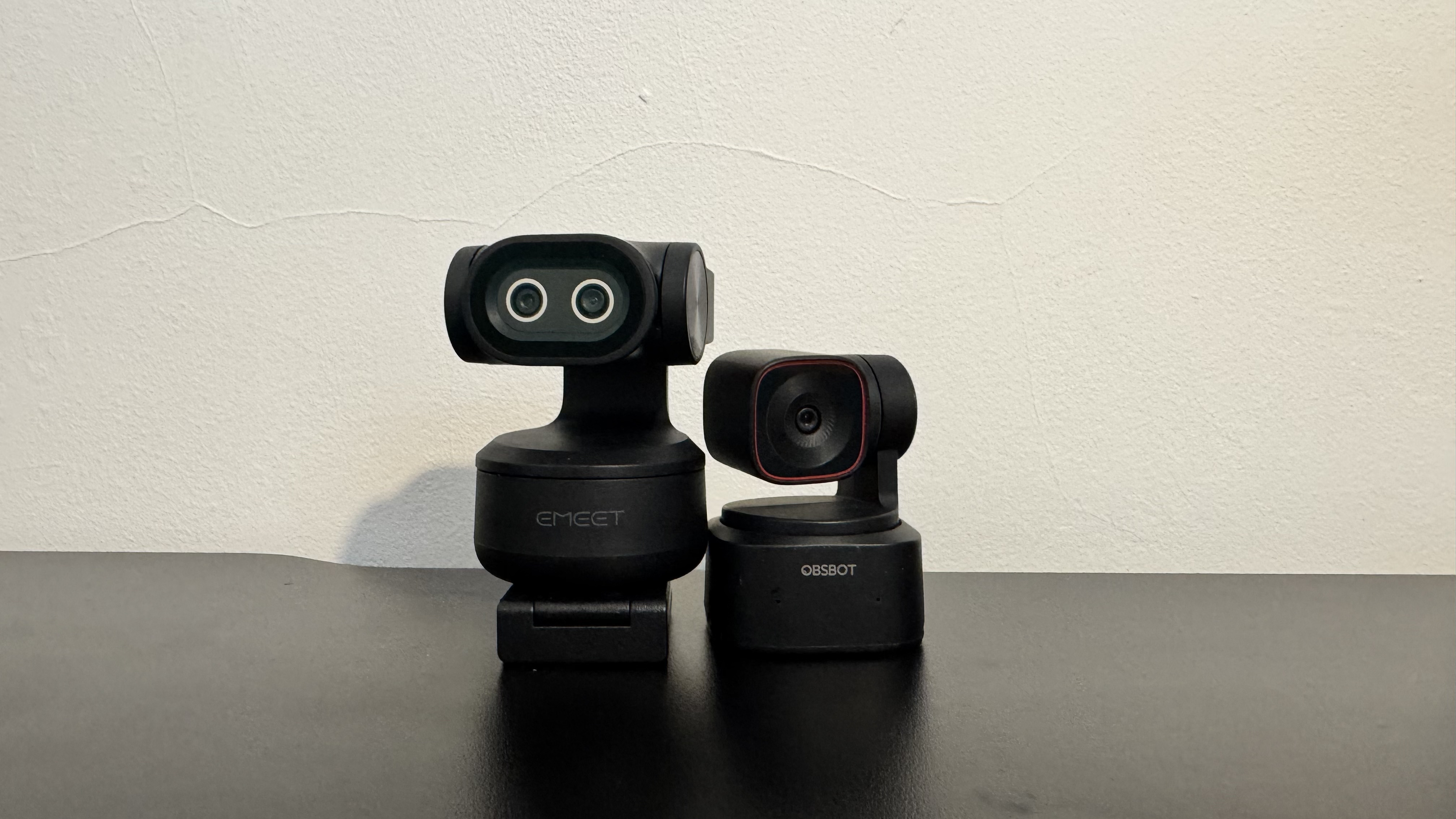 A side by side comparison of the Obsbot Tiny 2 Lite and the Emeet Pixy