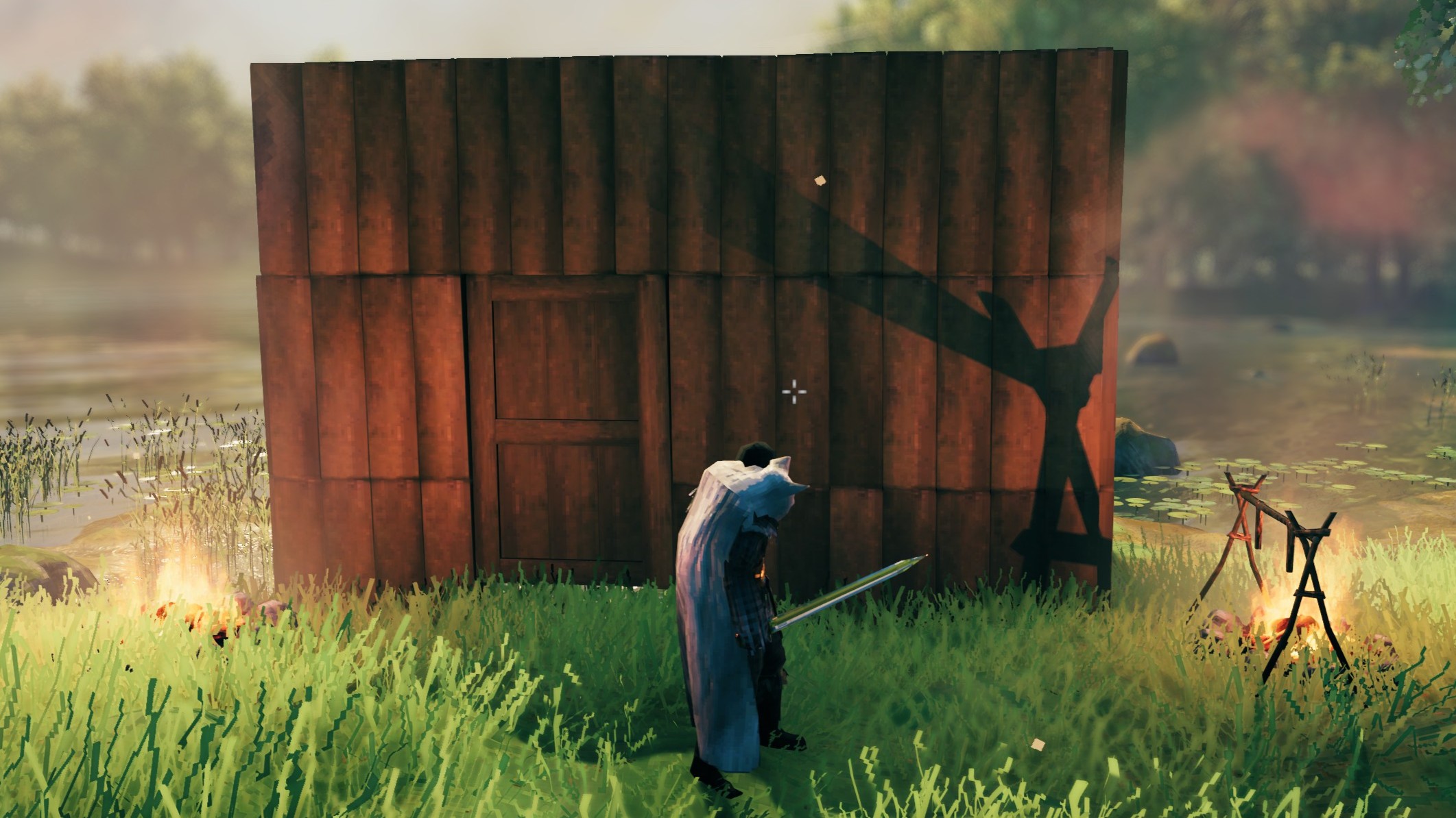 A perfectly square-shaped cabin in Valheim. There's not even a roof. It's flat with only one door.
